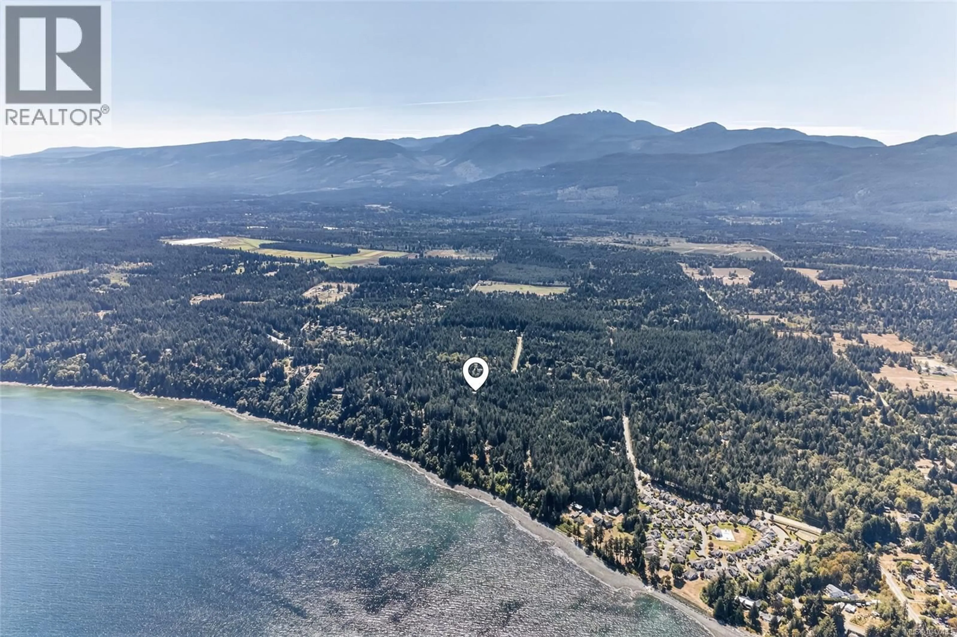 A pic from outside/outdoor area/front of a property/back of a property/a pic from drone, water/lake/river/ocean view for 5154 ISLAND HIGHWAY WEST, Qualicum Beach British Columbia V9K1Z1