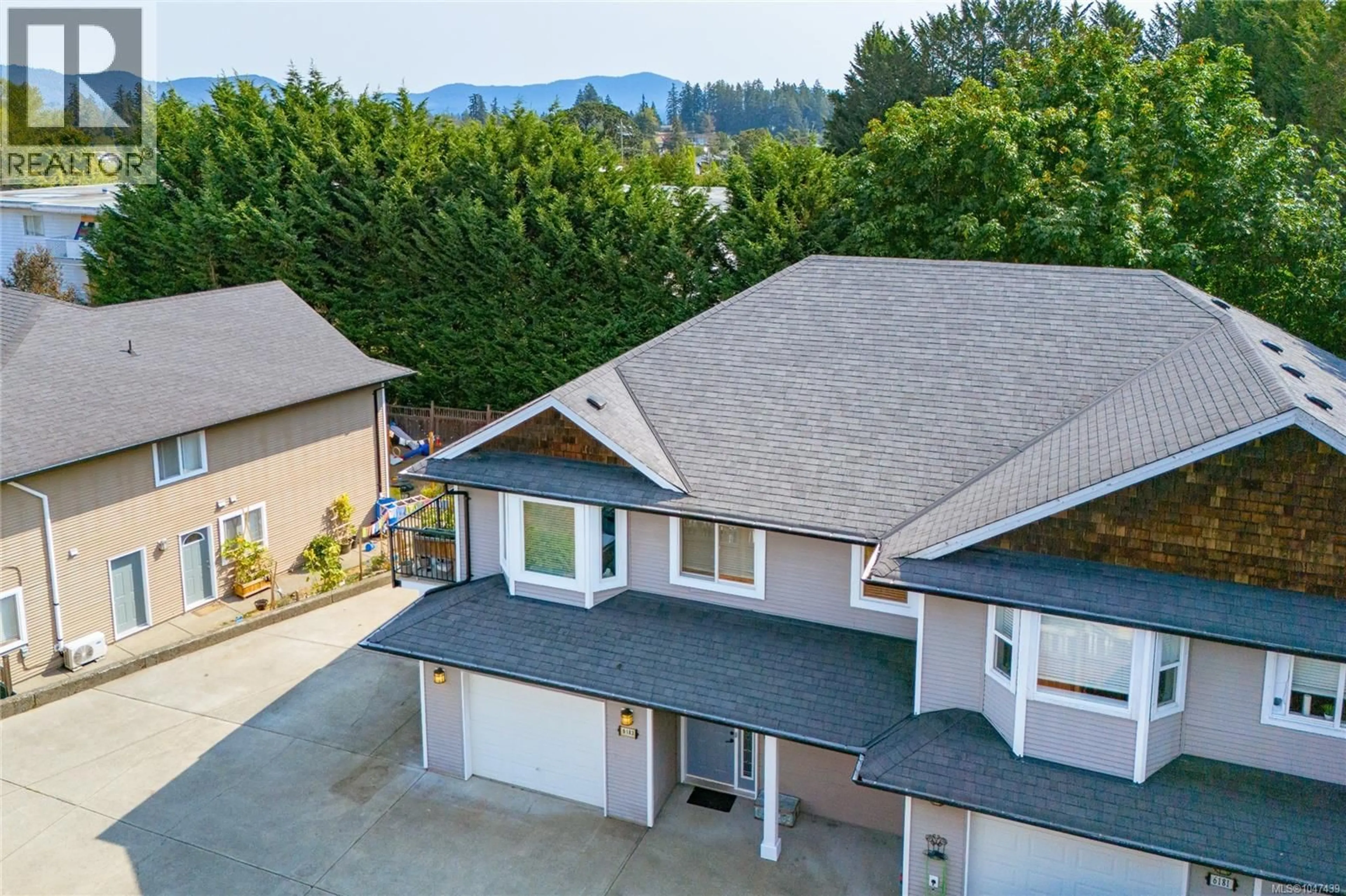 A pic from outside/outdoor area/front of a property/back of a property/a pic from drone, mountain view for 6183 DROMBEG PLACE, Duncan British Columbia V9L0A8