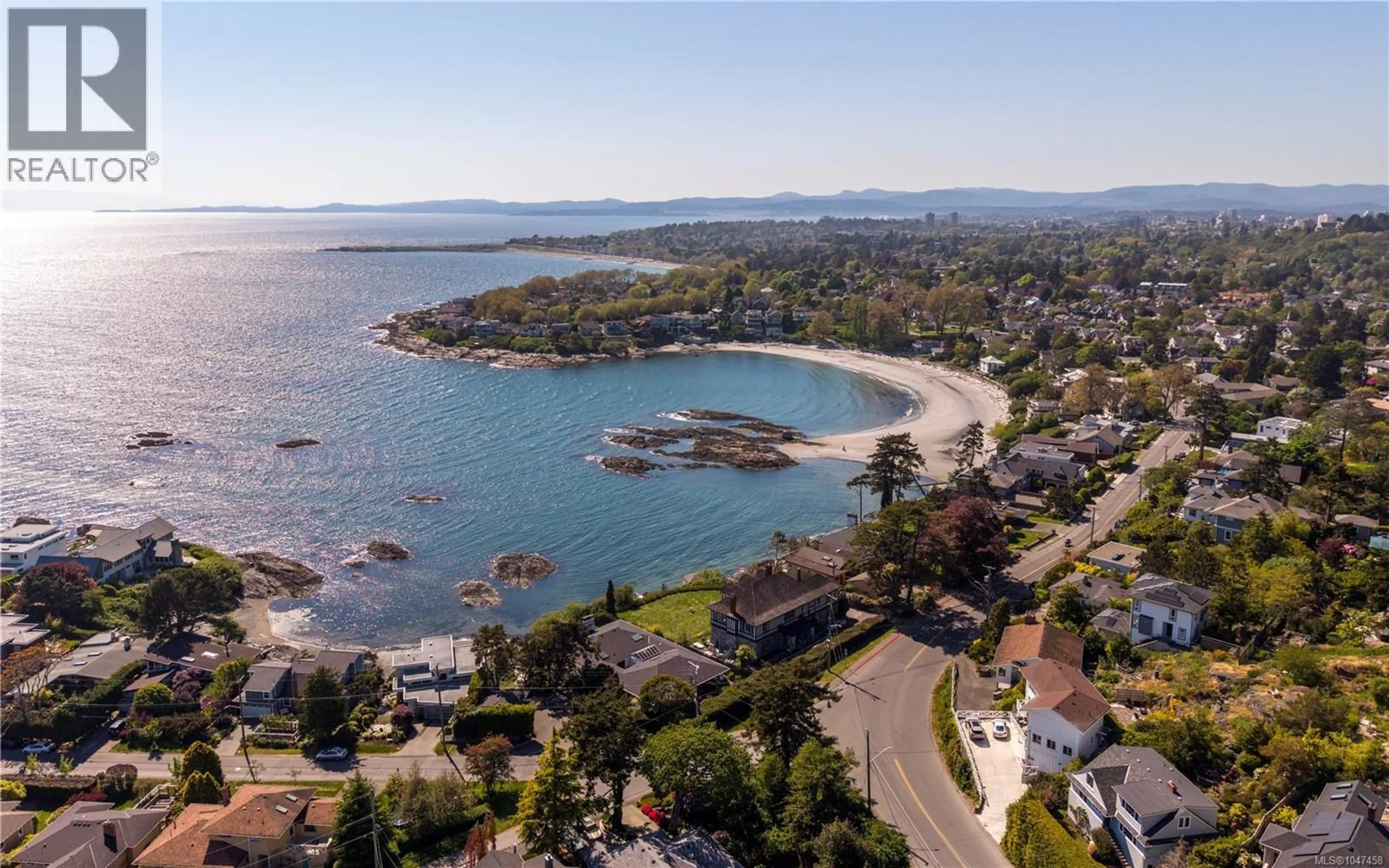 A pic from outside/outdoor area/front of a property/back of a property/a pic from drone, water/lake/river/ocean view for 100 KING GEORGE TERRACE, Oak Bay British Columbia V8S2J9