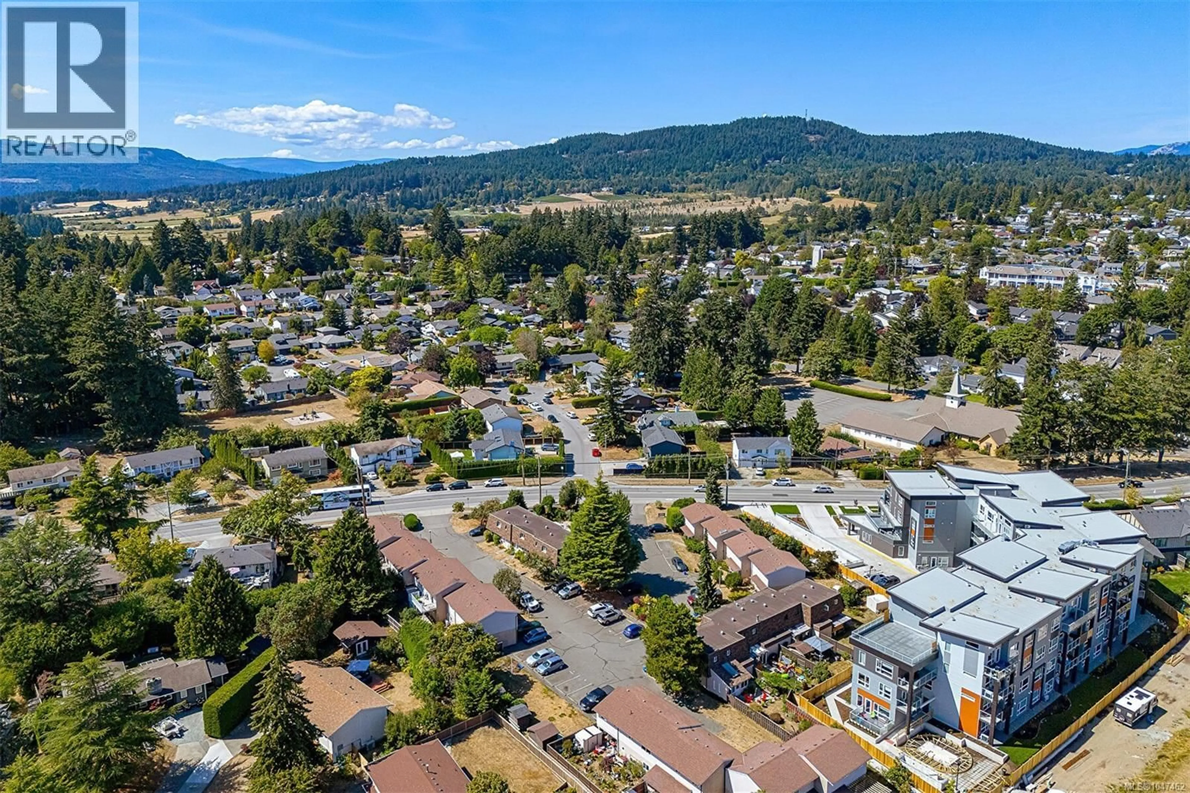 A pic from outside/outdoor area/front of a property/back of a property/a pic from drone, mountain view for 11 - 7675 EAST SAANICH ROAD, Central Saanich British Columbia V8M1L9