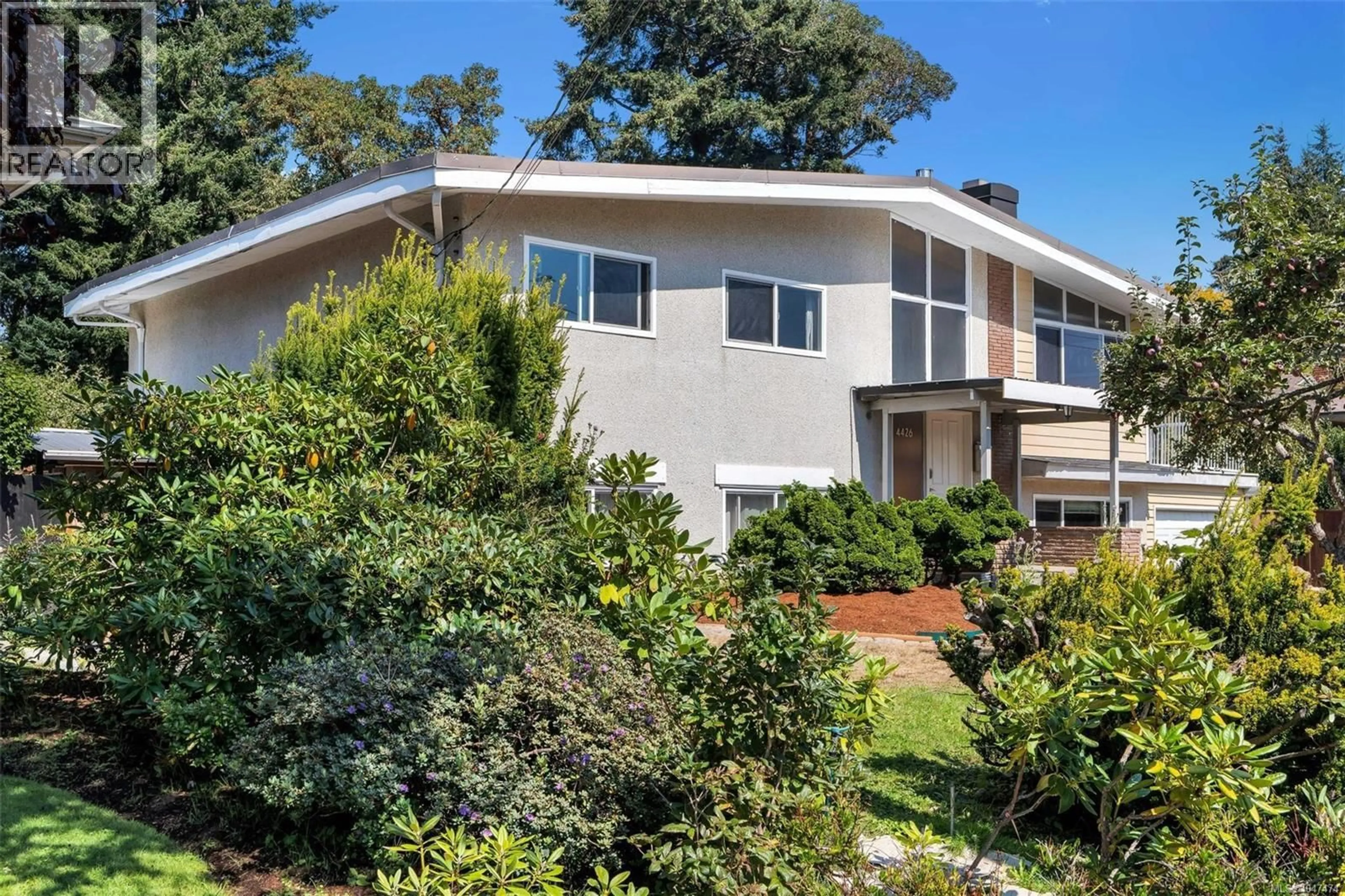 Home with vinyl exterior material, street for 4426 CHARTWELL DRIVE, Saanich British Columbia V8N2R3