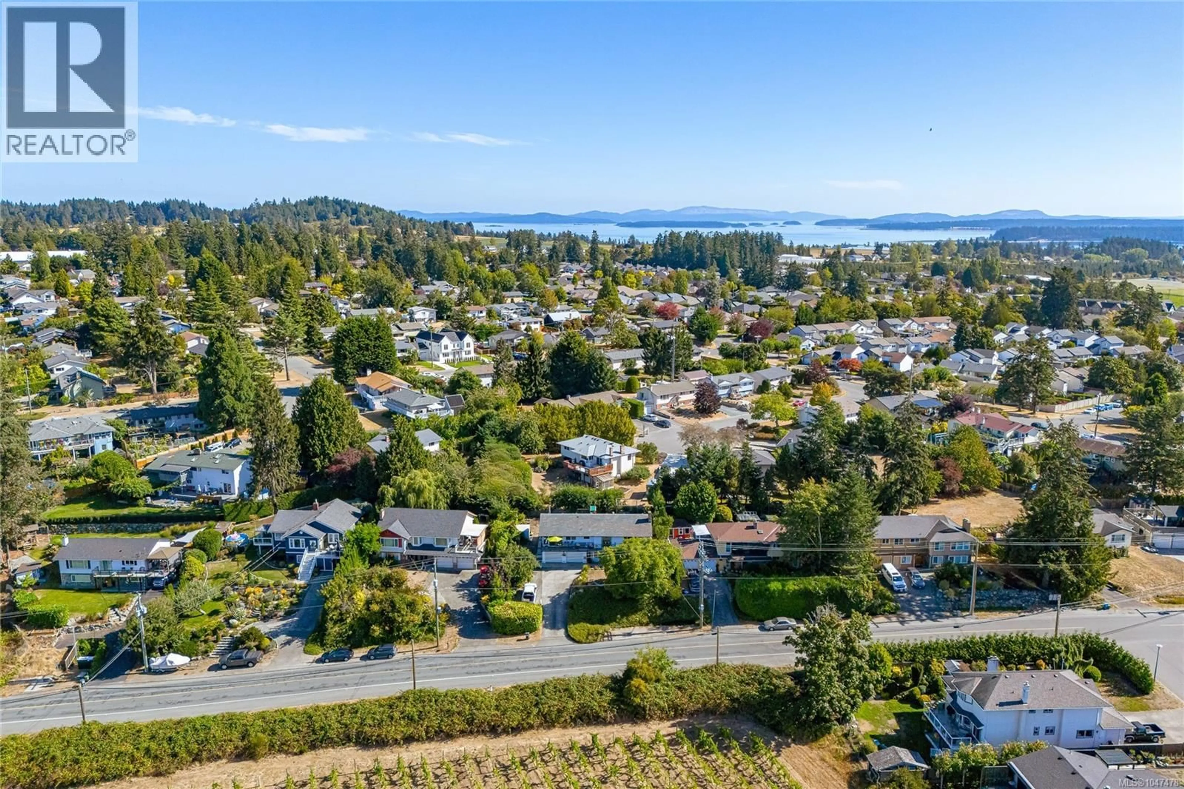 A pic from outside/outdoor area/front of a property/back of a property/a pic from drone, water/lake/river/ocean view for 1854 MT. NEWTON CROSS ROAD, Central Saanich British Columbia V8M1L1