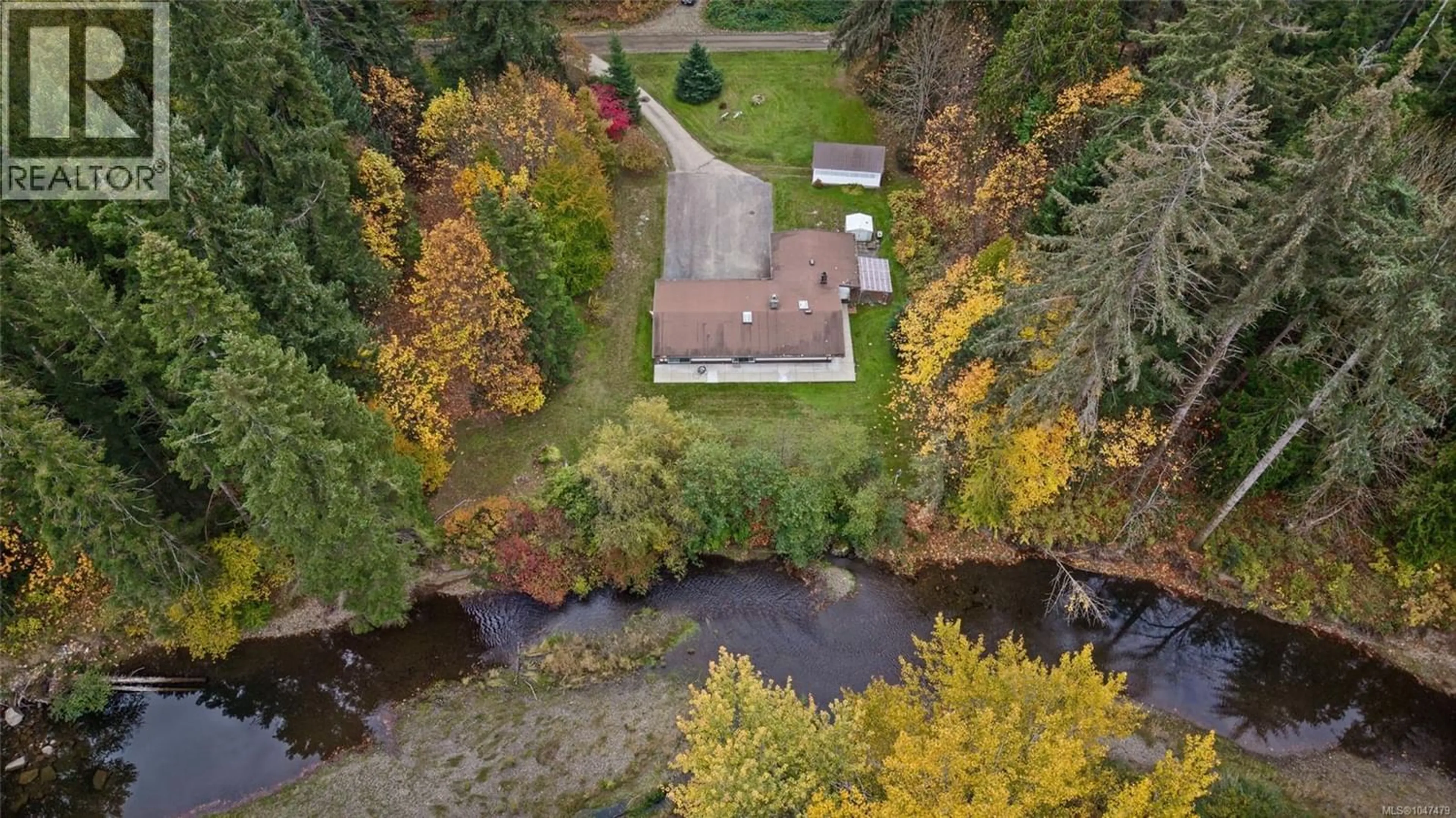 A pic from outside/outdoor area/front of a property/back of a property/a pic from drone, water/lake/river/ocean view for 3054 STEPHEN ROAD, Courtenay British Columbia V9J1P2