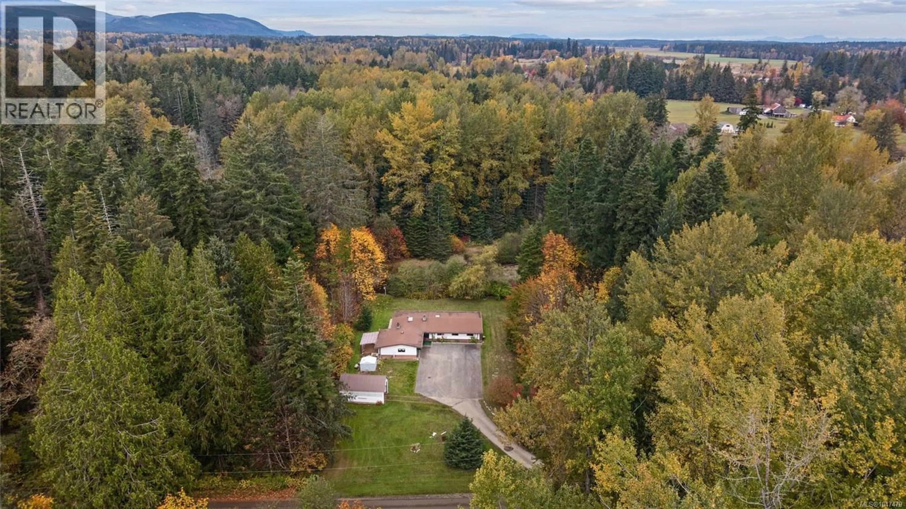 A pic from outside/outdoor area/front of a property/back of a property/a pic from drone, forest/trees view for 3054 STEPHEN ROAD, Courtenay British Columbia V9J1P2