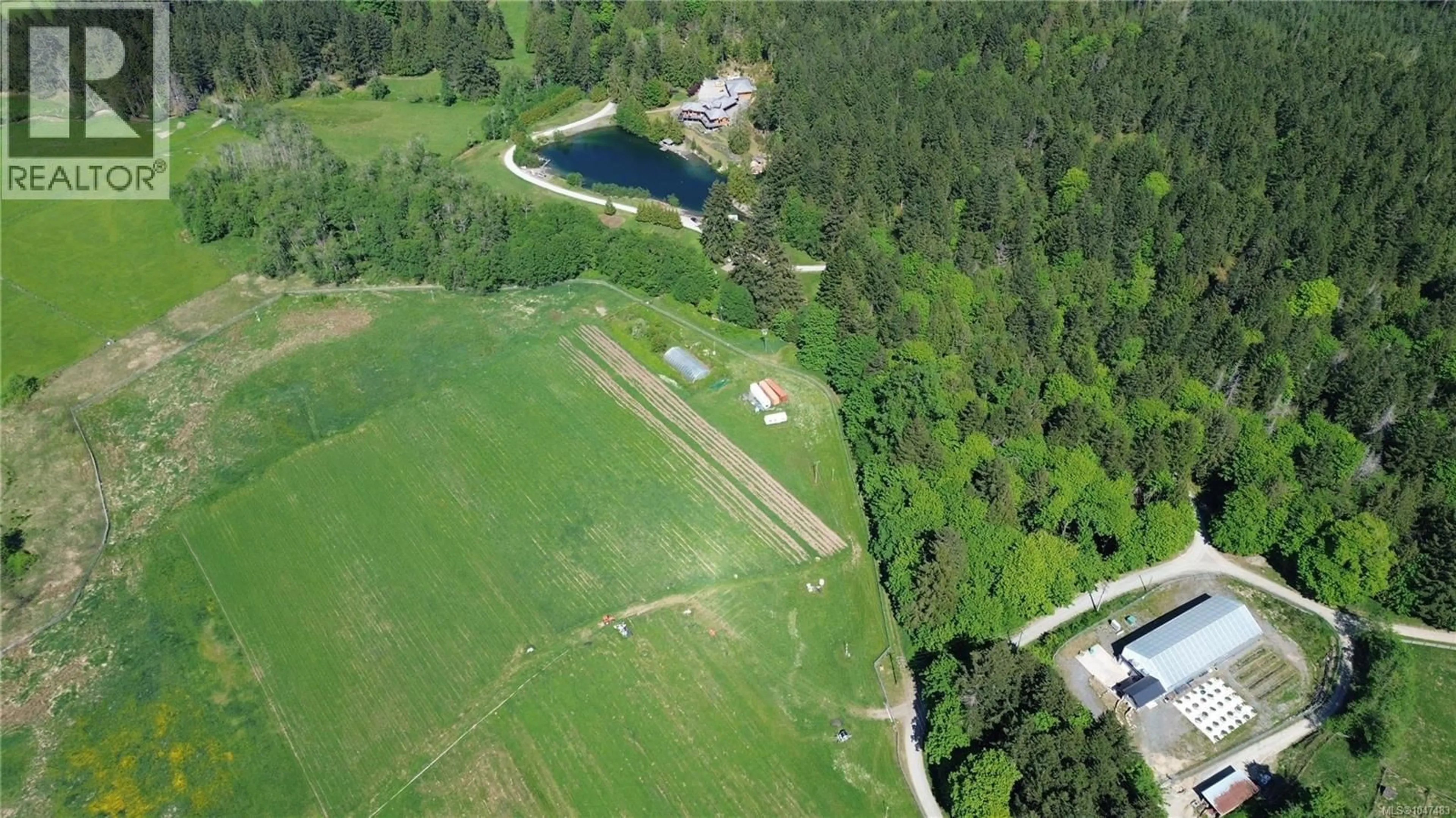 A pic from outside/outdoor area/front of a property/back of a property/a pic from drone, water/lake/river/ocean view for 2311/2307 SYLVESTER ROAD, Shawnigan Lake British Columbia V8H2A2