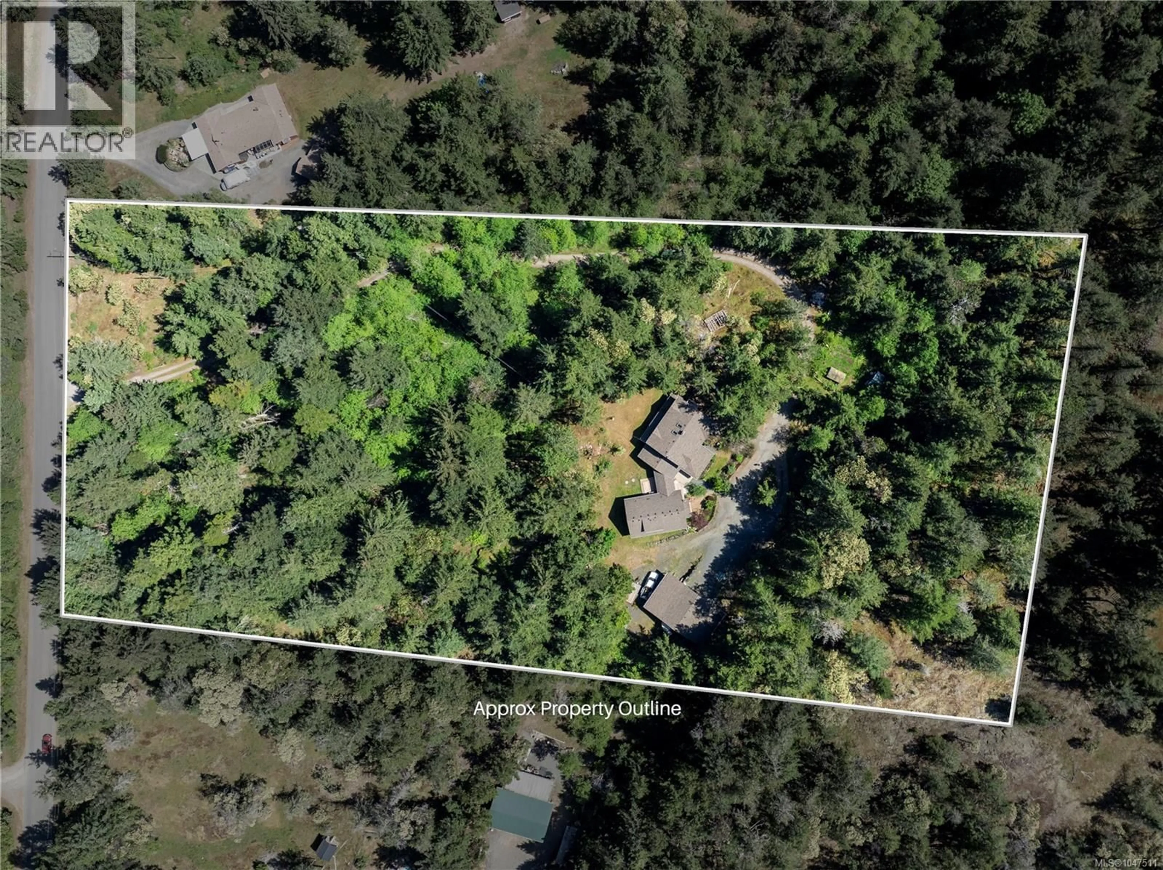 A pic from outside/outdoor area/front of a property/back of a property/a pic from drone, forest/trees view for 2800 BOYD DRIVE, Nanoose Bay British Columbia V9P9E9