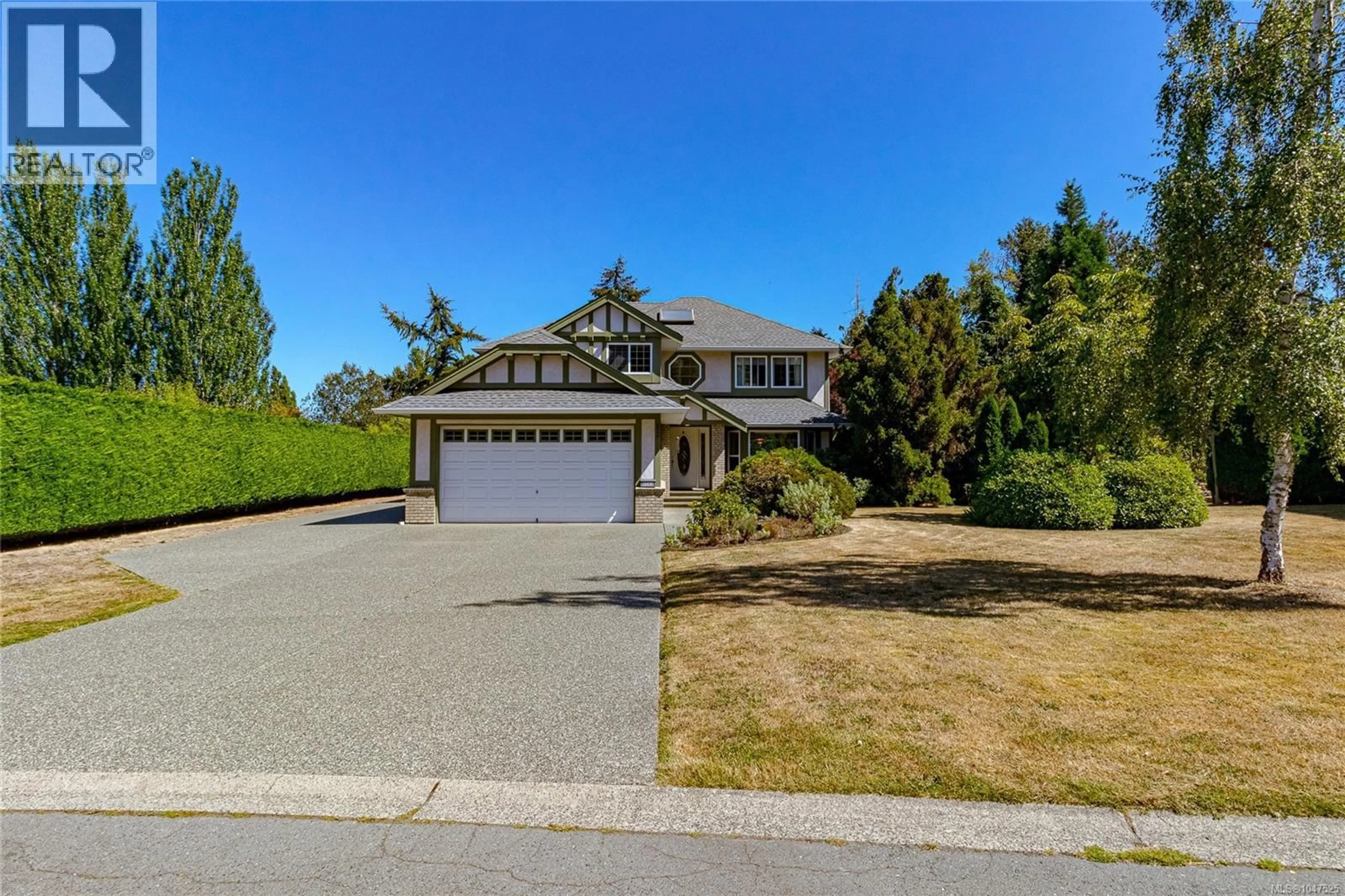 A pic from outside/outdoor area/front of a property/back of a property/a pic from drone, street for 9243 MAINWARING ROAD, North Saanich British Columbia V8L1J9