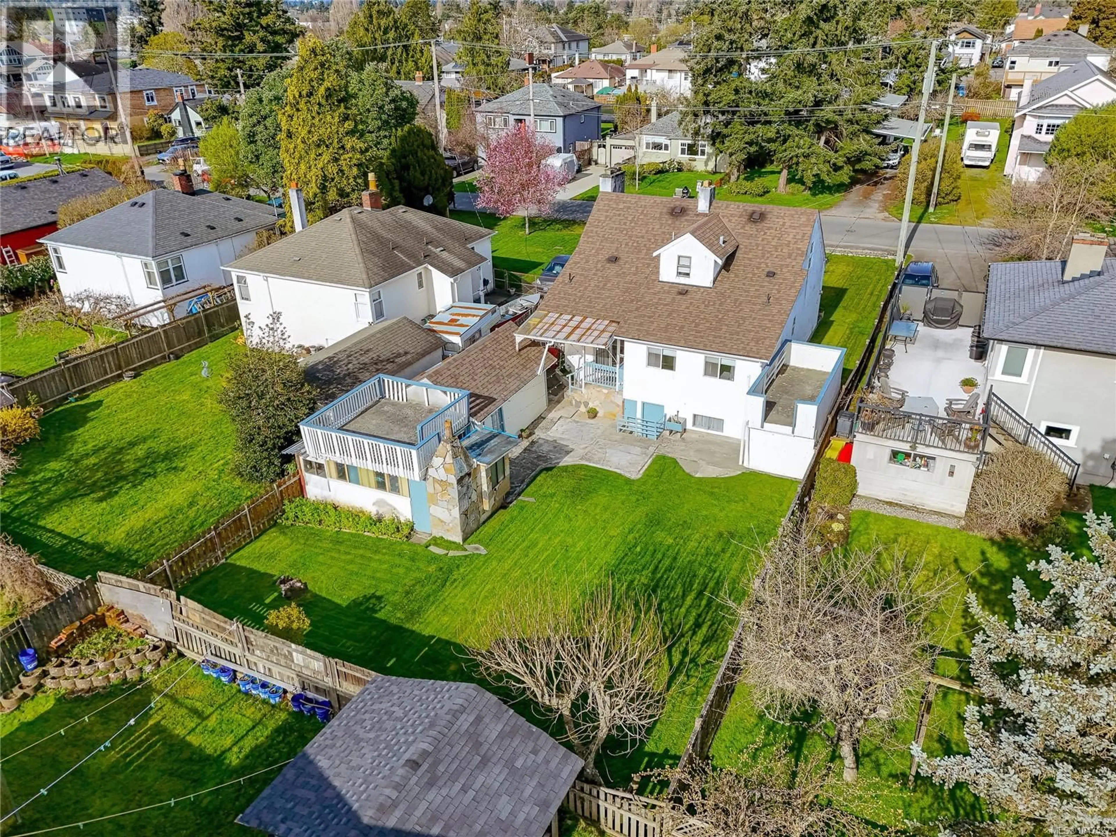 A pic from outside/outdoor area/front of a property/back of a property/a pic from drone, street for 3155 EARL GREY STREET, Saanich British Columbia V9A1X1