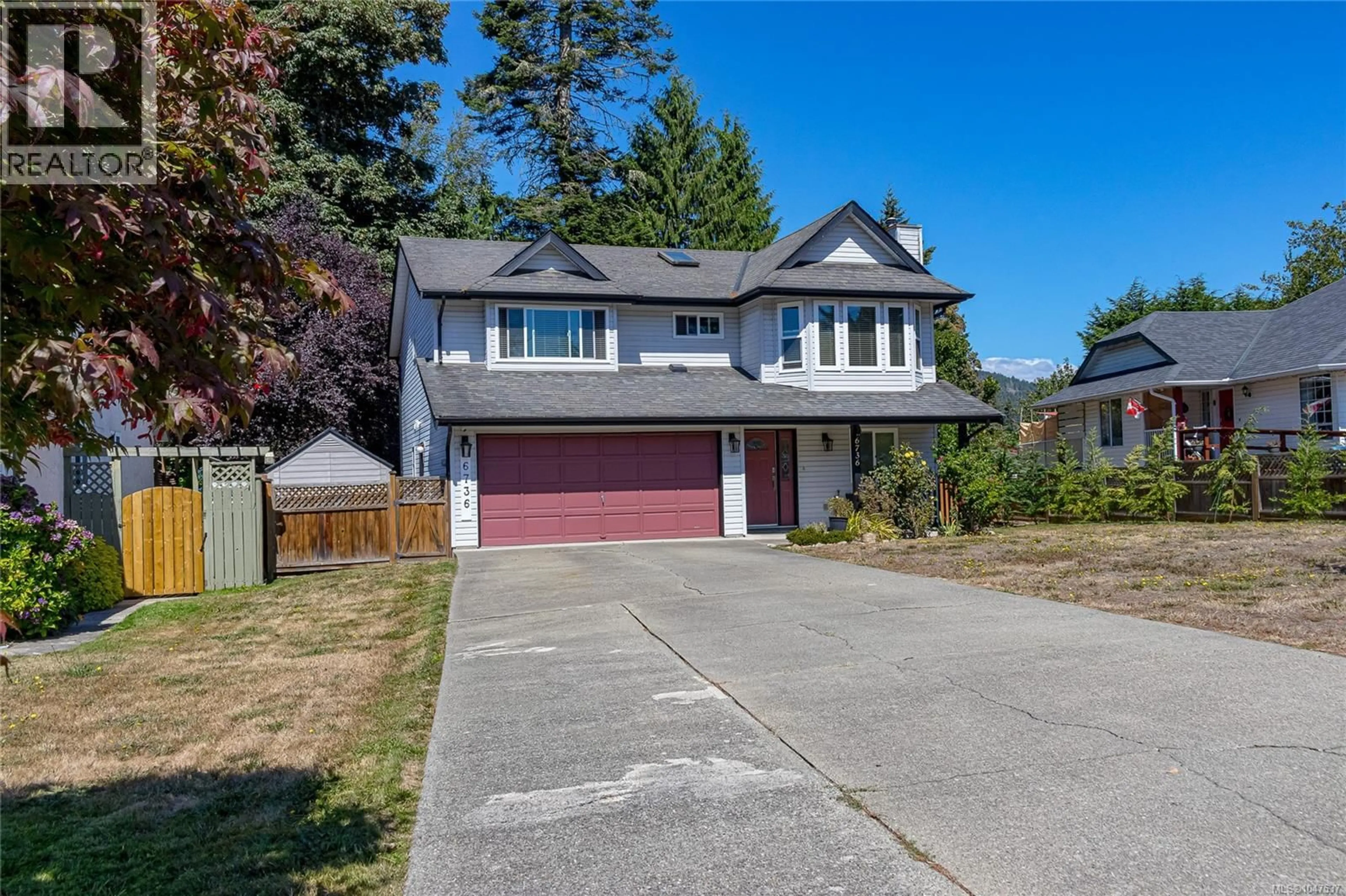 Home with vinyl exterior material, street for 6736 RHODONITE DRIVE, Sooke British Columbia V9Z0H5
