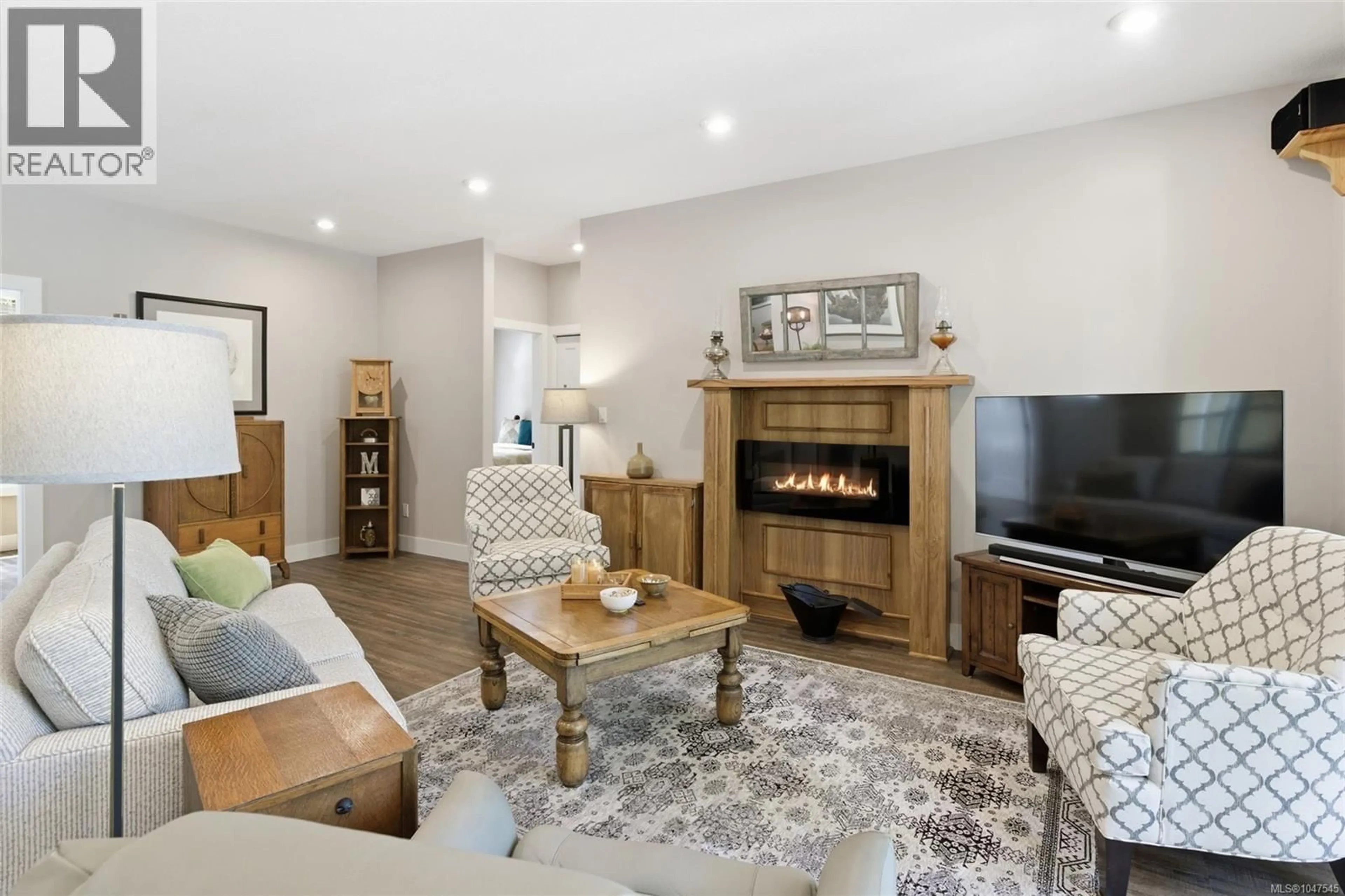 Living room with furniture, unknown for 3831 CREEKSIDE DRIVE, Bowser British Columbia V0R1G0