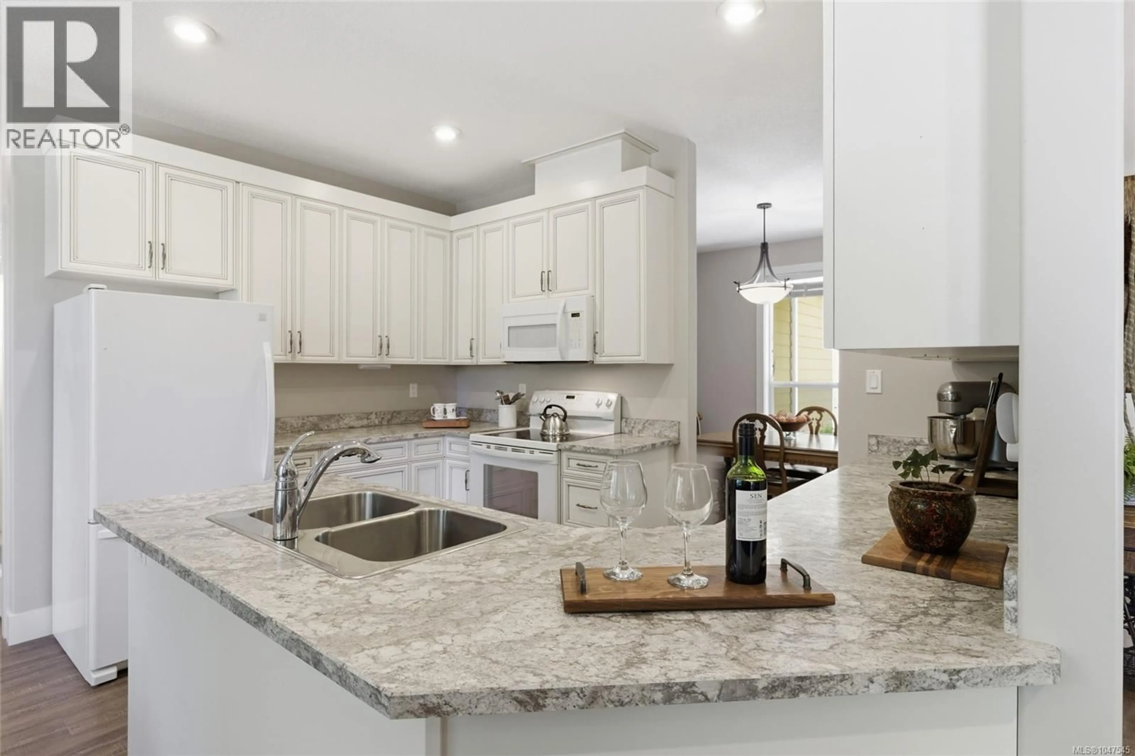 Open concept kitchen, ceramic/tile floor for 3831 CREEKSIDE DRIVE, Bowser British Columbia V0R1G0