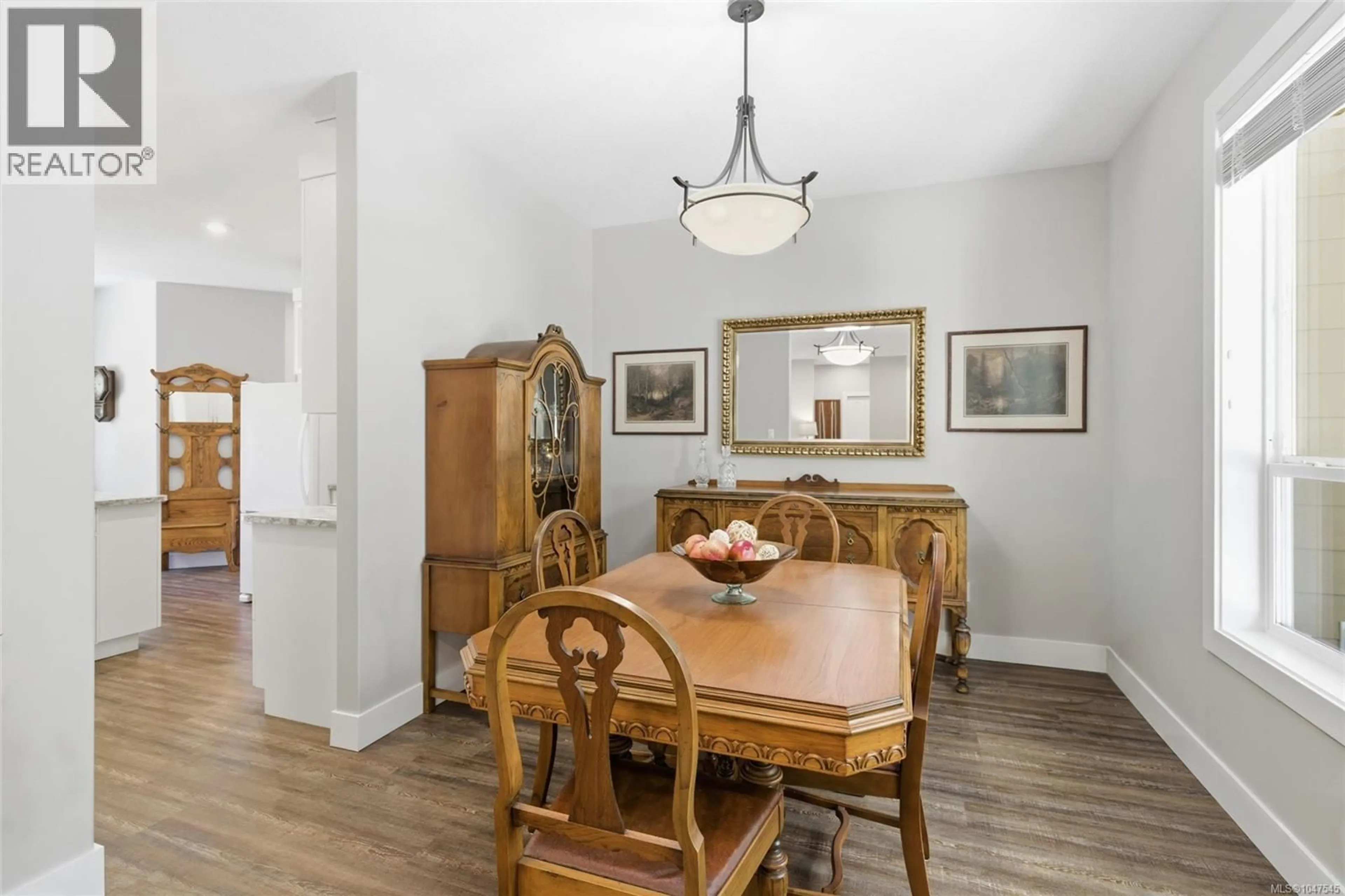 Dining room, wood/laminate floor for 3831 CREEKSIDE DRIVE, Bowser British Columbia V0R1G0