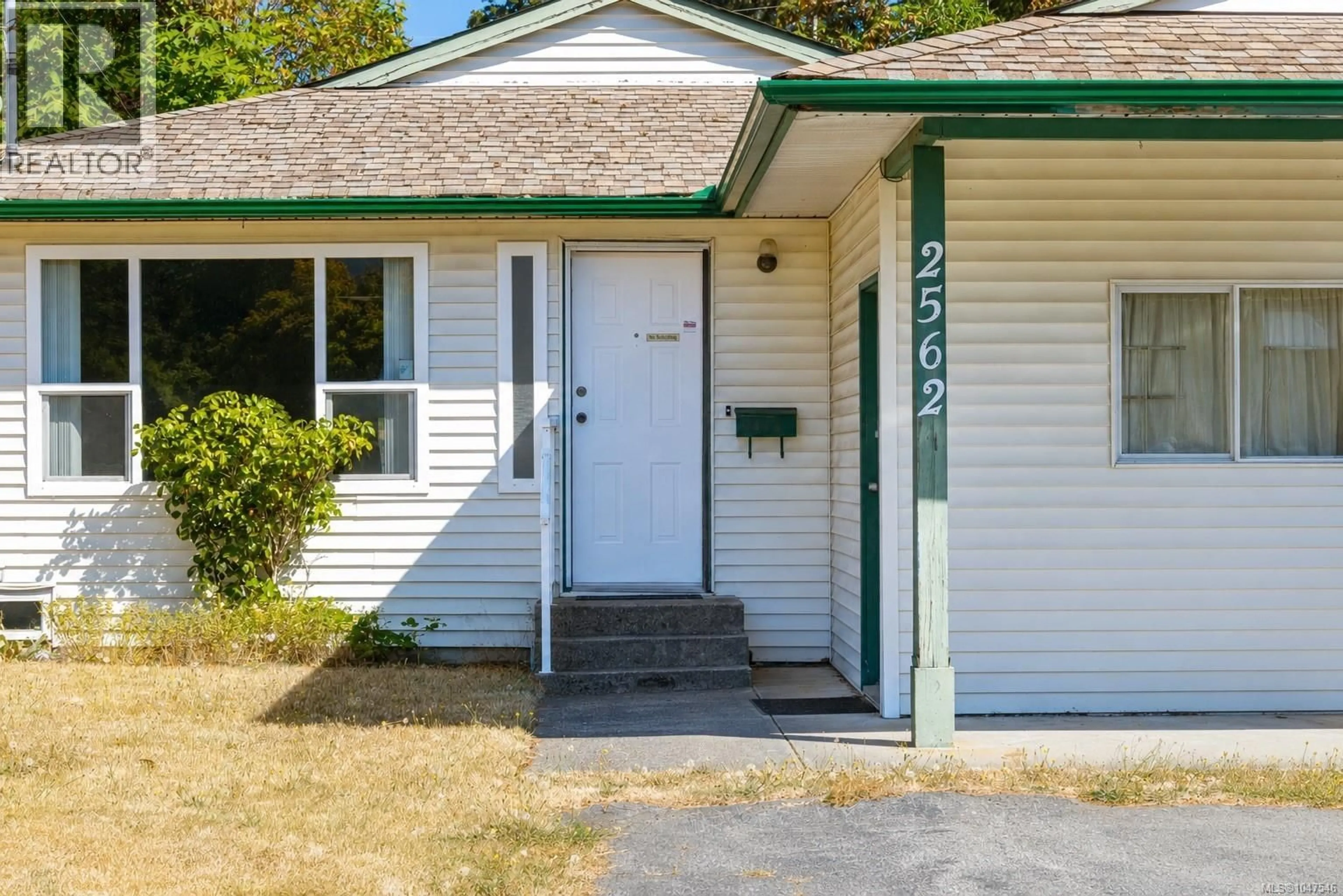 Home with vinyl exterior material, street for 2562 ROSSTOWN ROAD, Nanaimo British Columbia V9T3R8