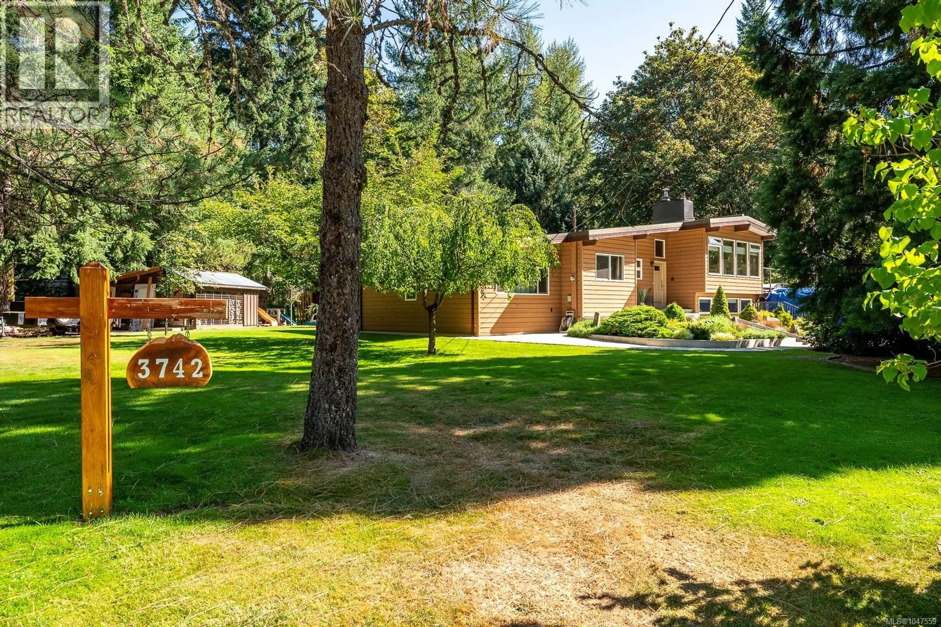 A pic from outside/outdoor area/front of a property/back of a property/a pic from drone, forest/trees view for 3742 JAMES CRESCENT, Black Creek British Columbia V9J1E9