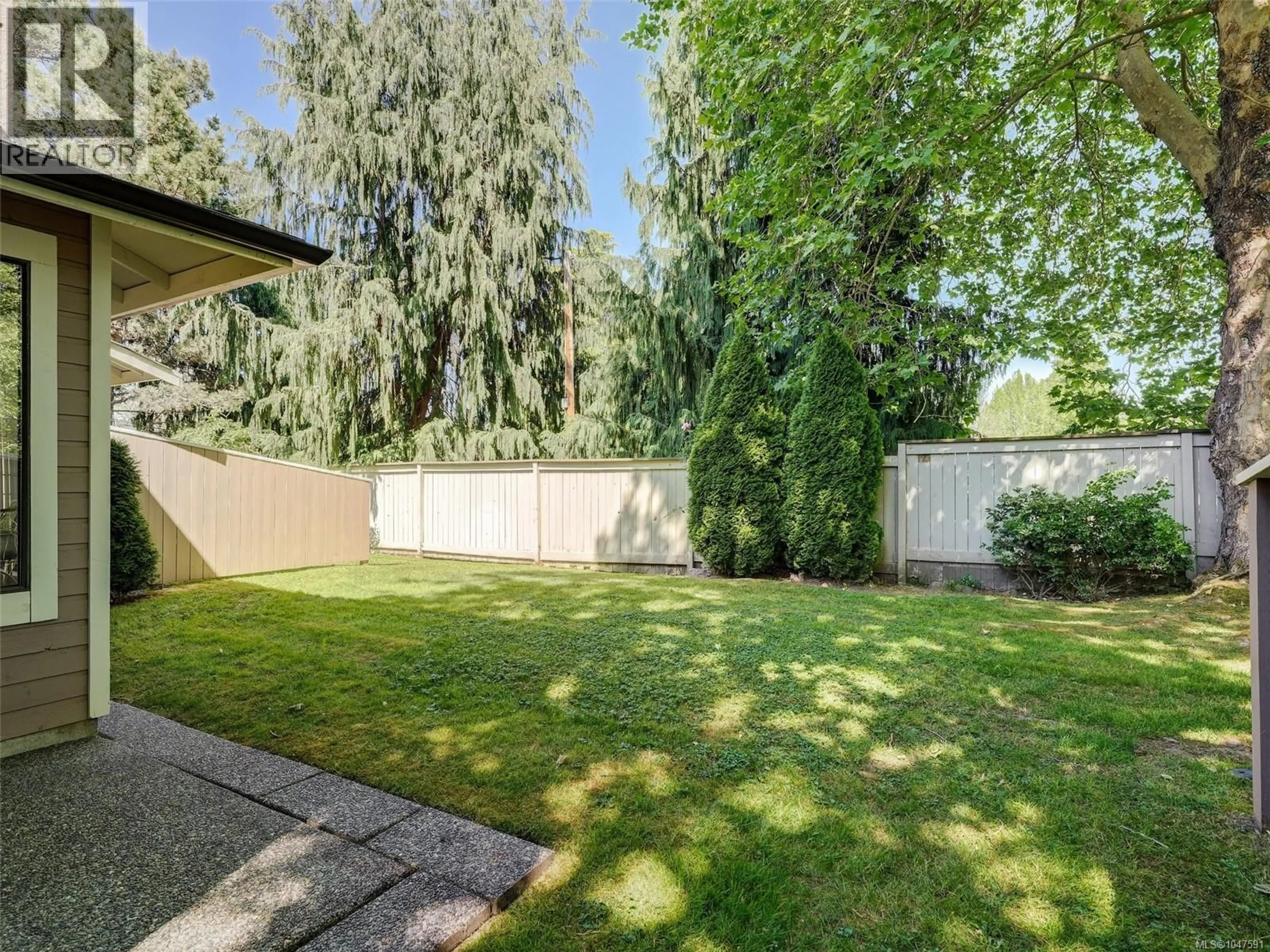 A pic from outside/outdoor area/front of a property/back of a property/a pic from drone, street for 2 - 1309 MCKENZIE AVENUE, Saanich British Columbia V8P2M1