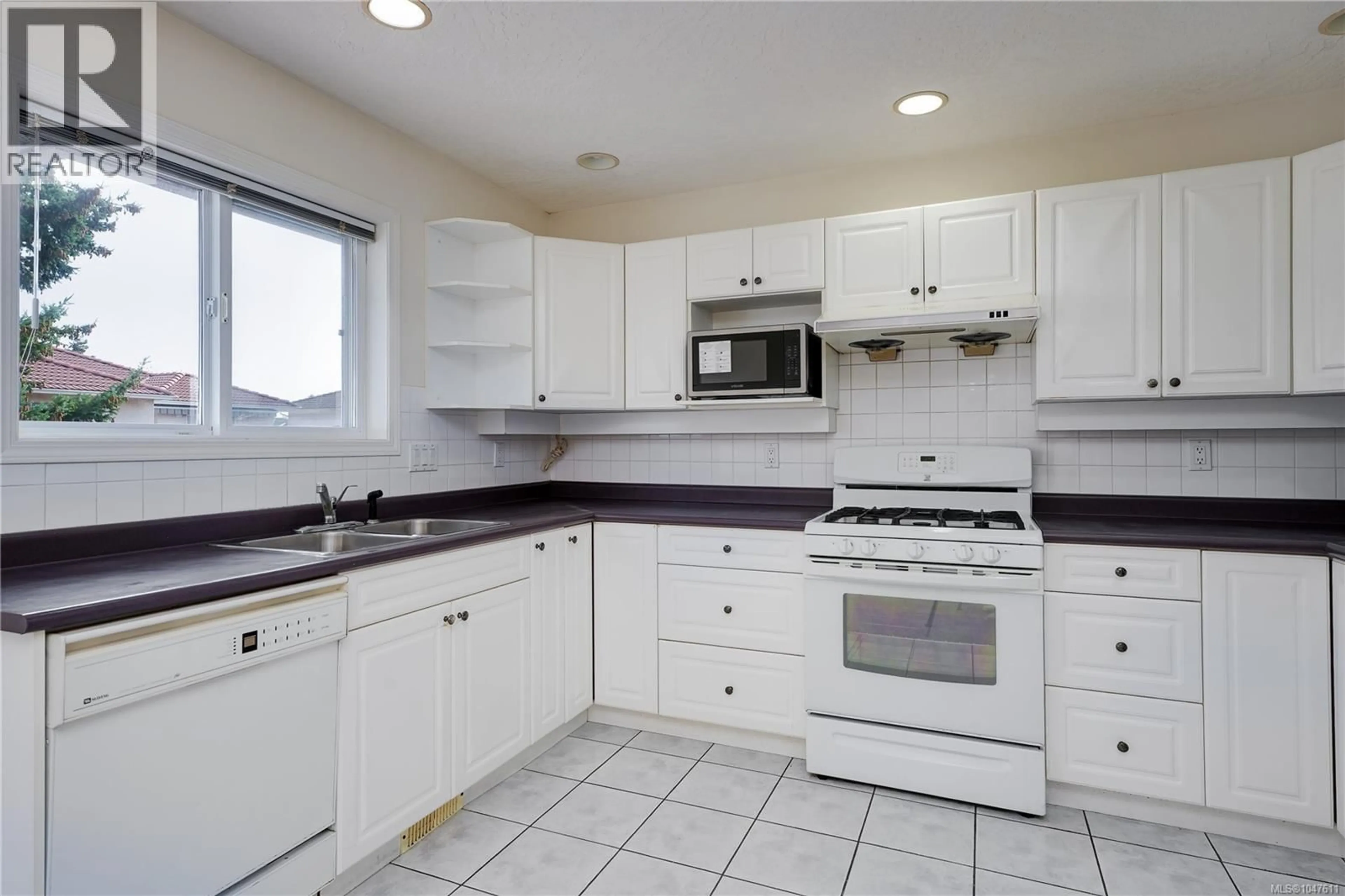 Standard kitchen, ceramic/tile floor for 4005 GORDON HEAD ROAD, Saanich British Columbia V8N3X4