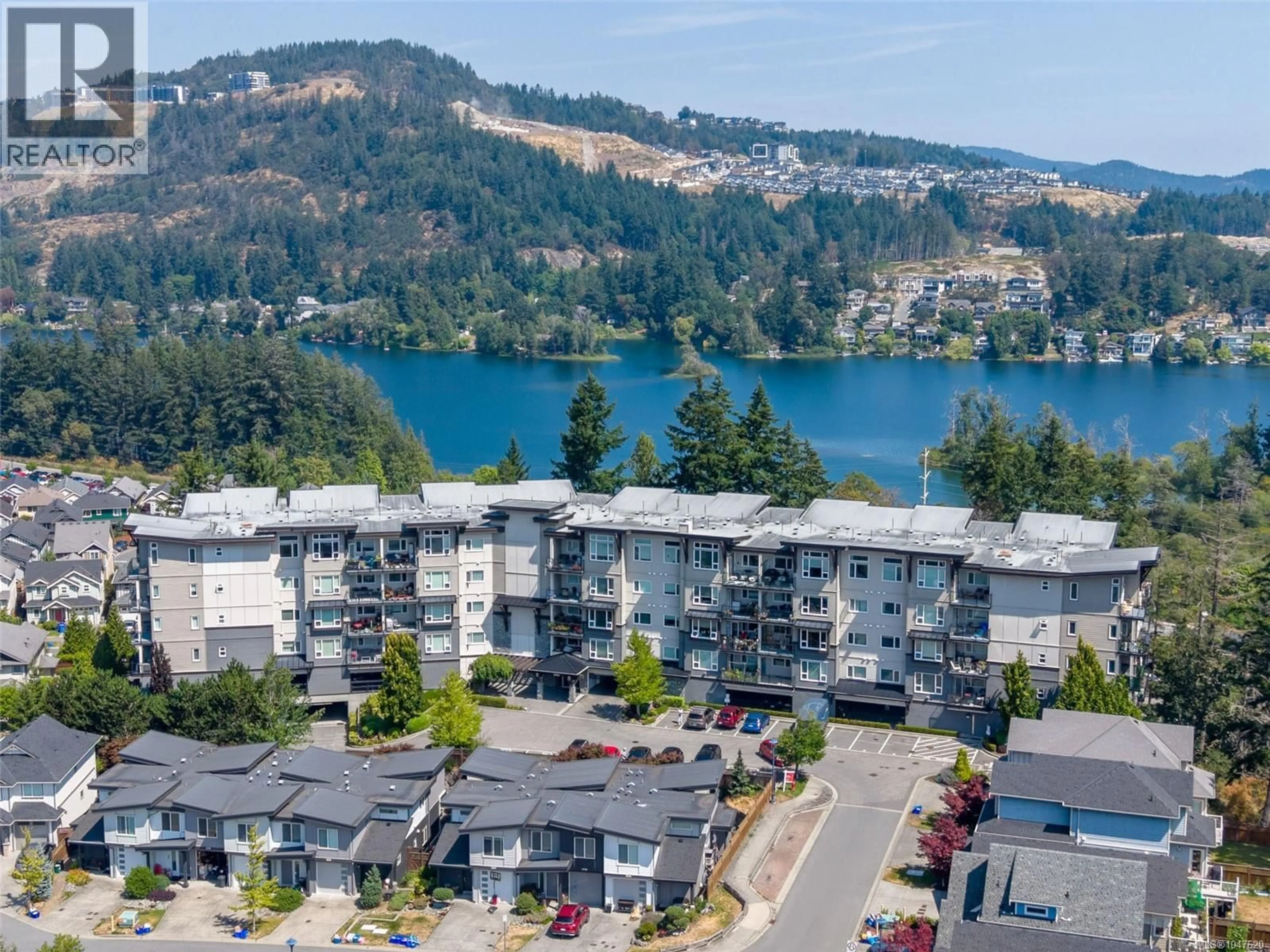 A pic from outside/outdoor area/front of a property/back of a property/a pic from drone, water/lake/river/ocean view for 313 - 1145 SIKORSKY ROAD, Langford British Columbia V9B0M8