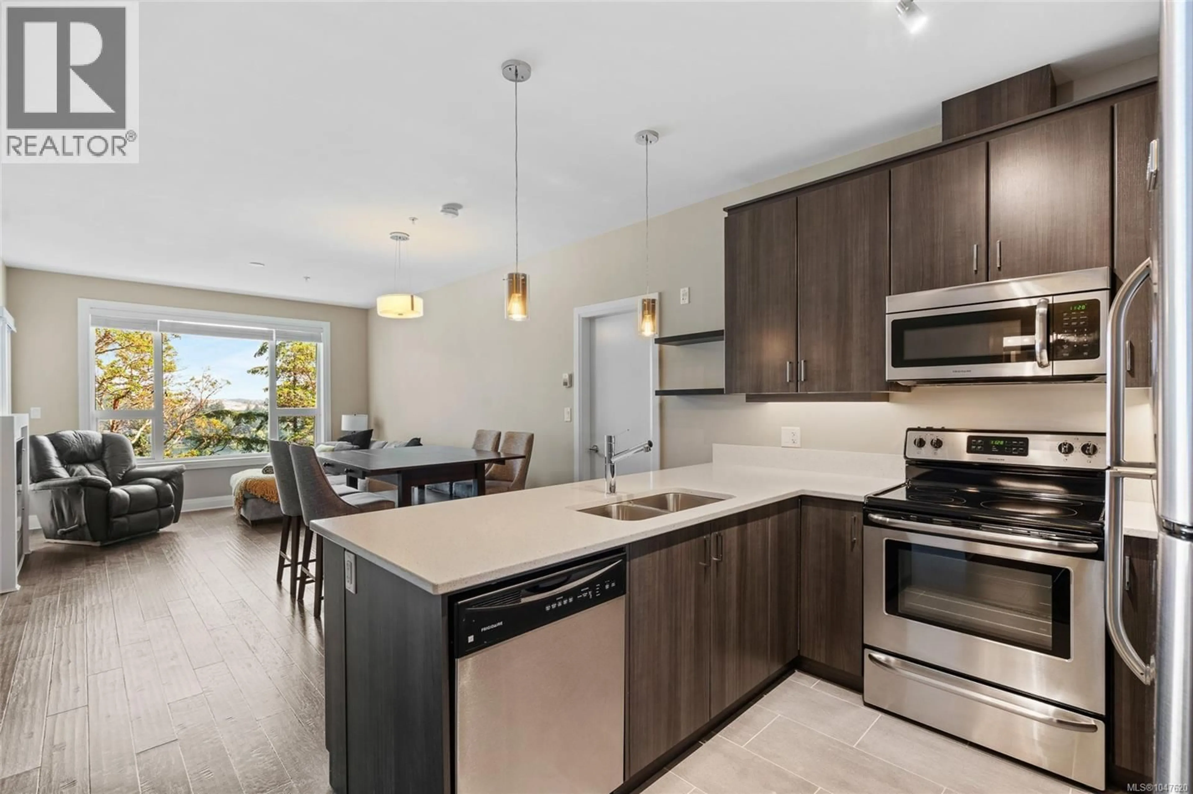 Open concept kitchen, ceramic/tile floor for 313 - 1145 SIKORSKY ROAD, Langford British Columbia V9B0M8