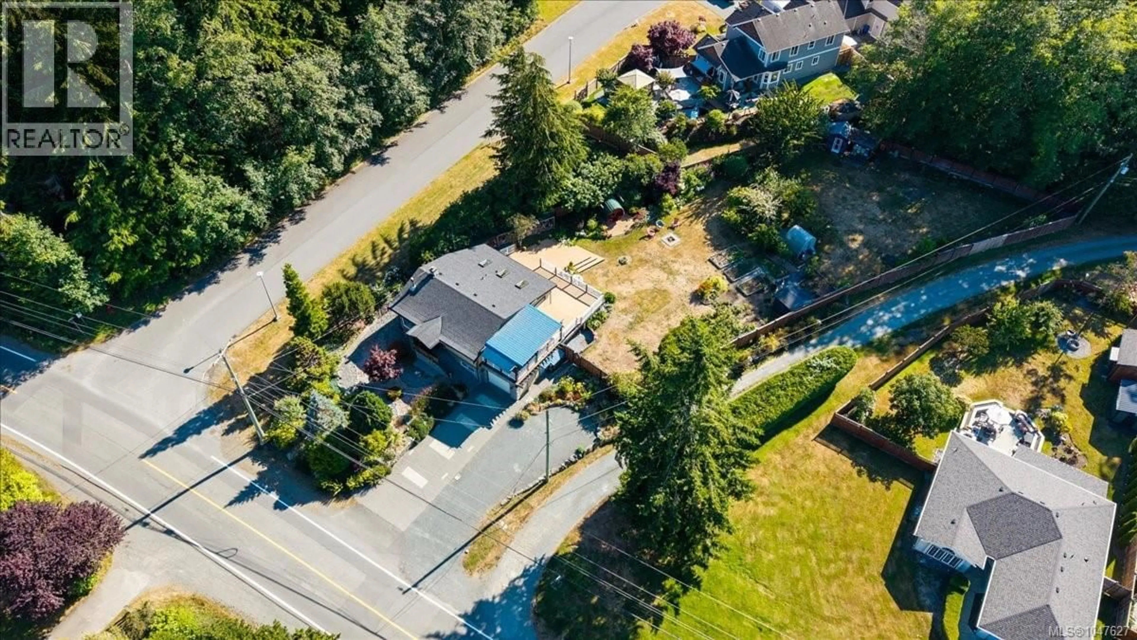 A pic from outside/outdoor area/front of a property/back of a property/a pic from drone, street for 1638 WHIFFIN SPIT ROAD, Sooke British Columbia V9Z0T8