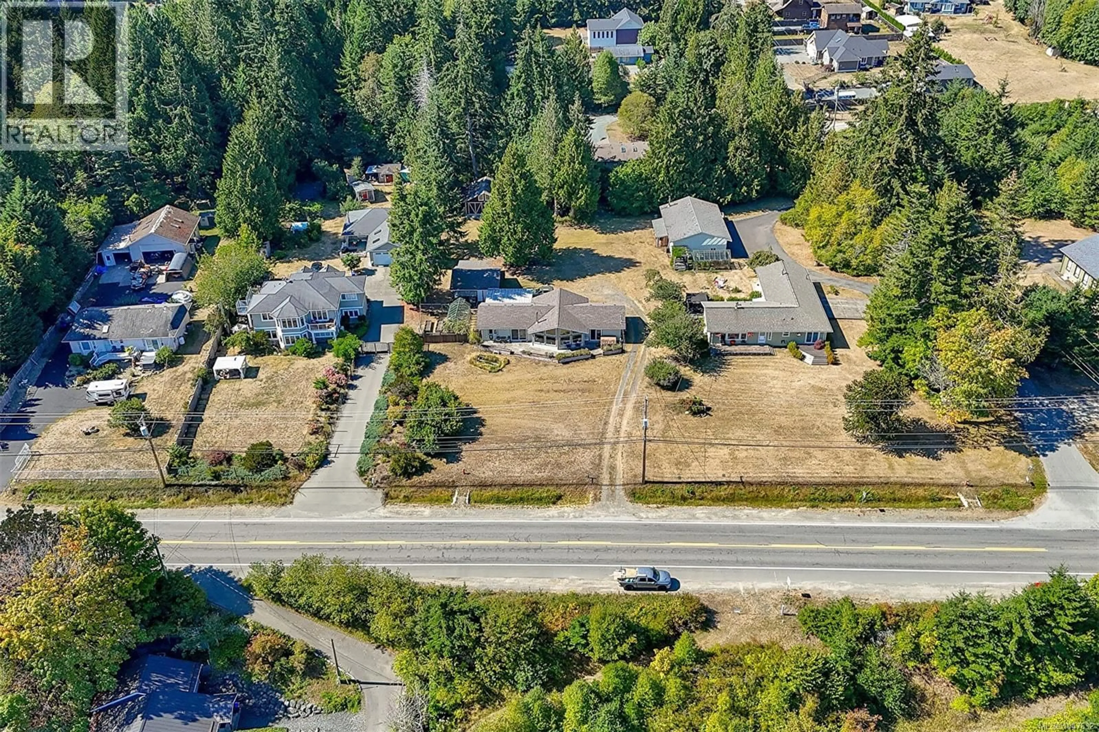 A pic from outside/outdoor area/front of a property/back of a property/a pic from drone, street for 6780 ISLAND HIGHWAY WEST, Bowser British Columbia V0R1G0