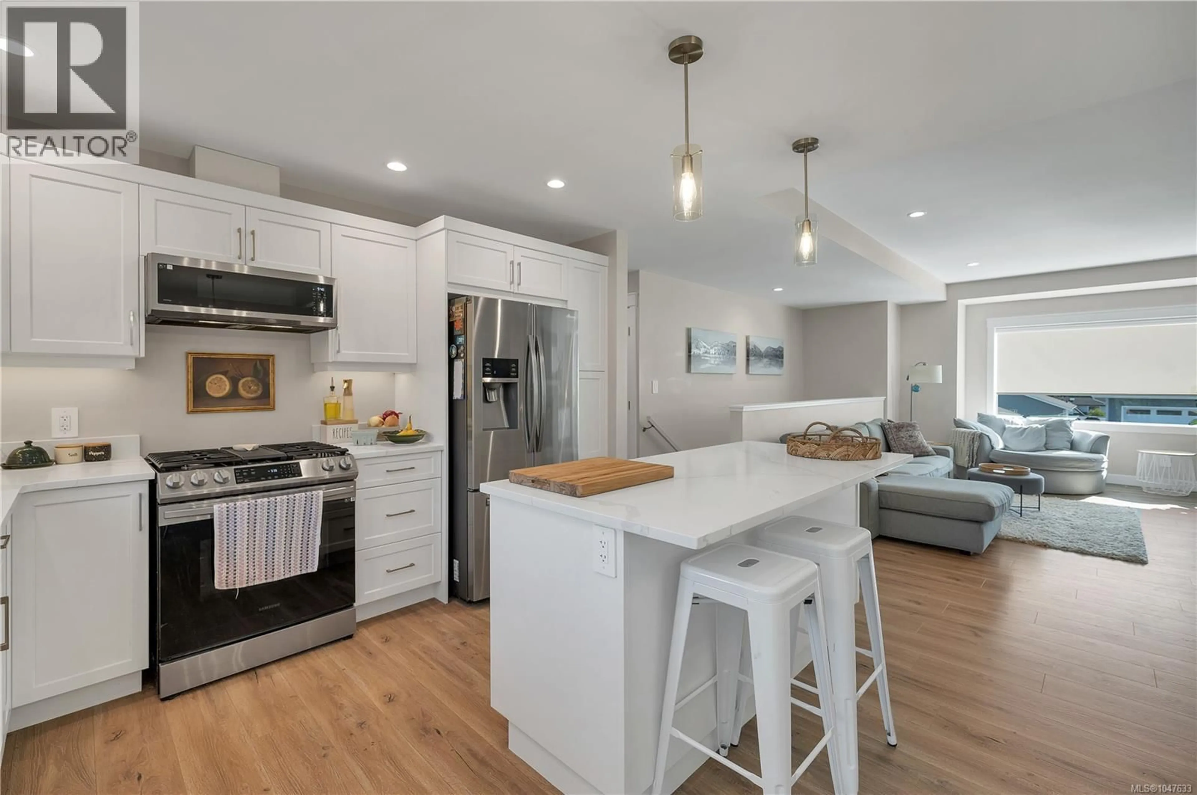 Open concept kitchen, wood/laminate floor for 2380 PENFIELD ROAD, Campbell River British Columbia V9W0E6