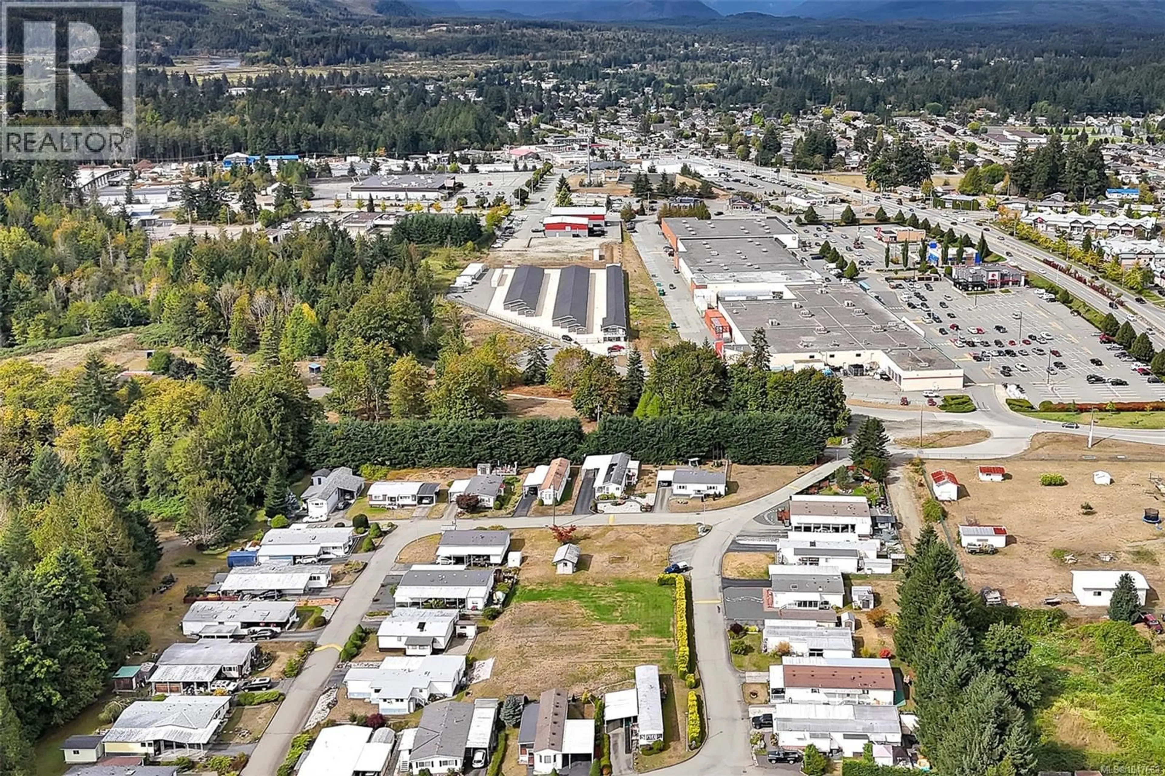 A pic from outside/outdoor area/front of a property/back of a property/a pic from drone, mountain view for 20 - 4935 BROUGHTON STREET, Port Alberni British Columbia V9Y8G7