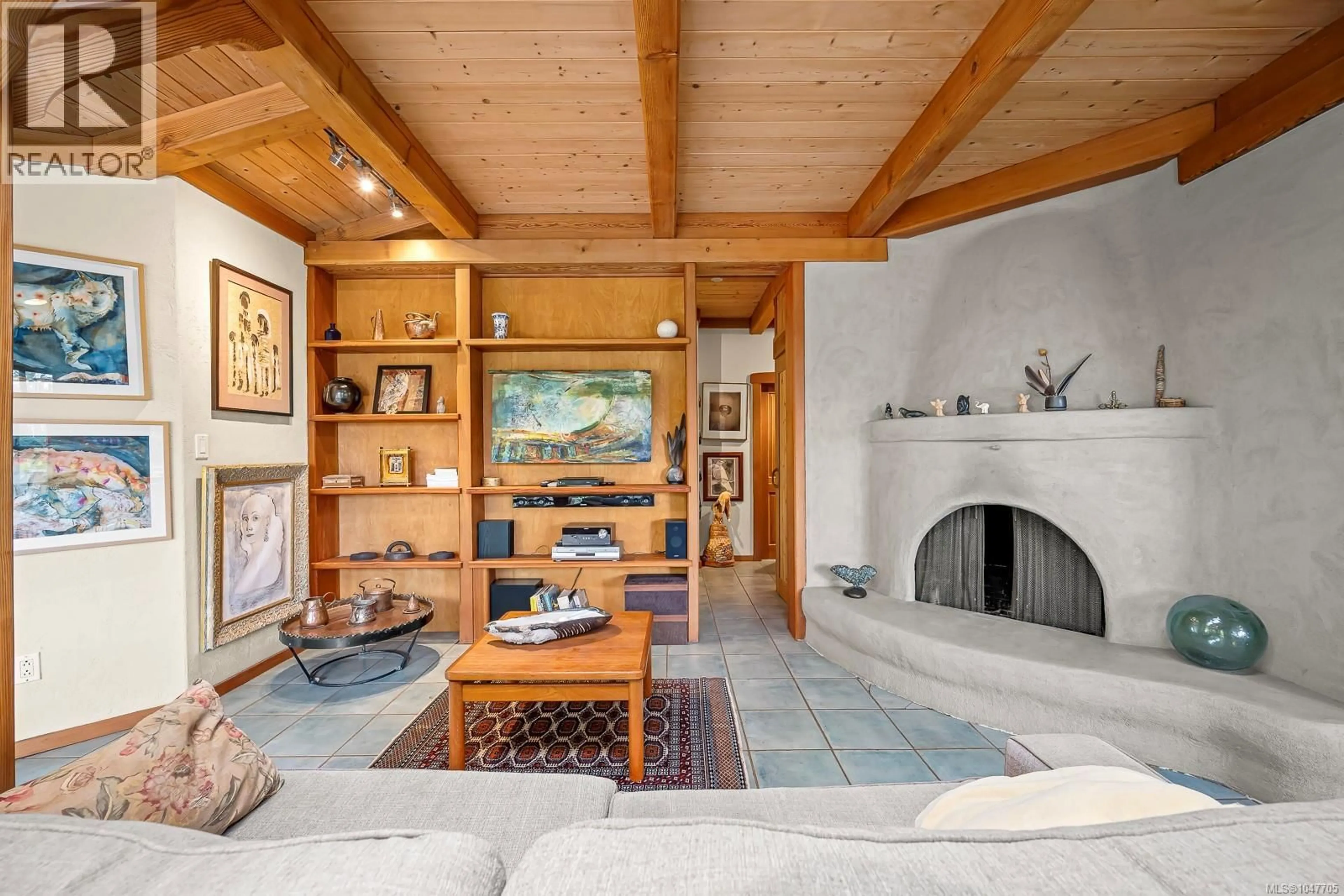 Living room with furniture, ceramic/tile floor for 437 CHAMADASKA WAY, Cortes Island British Columbia V0P1K0