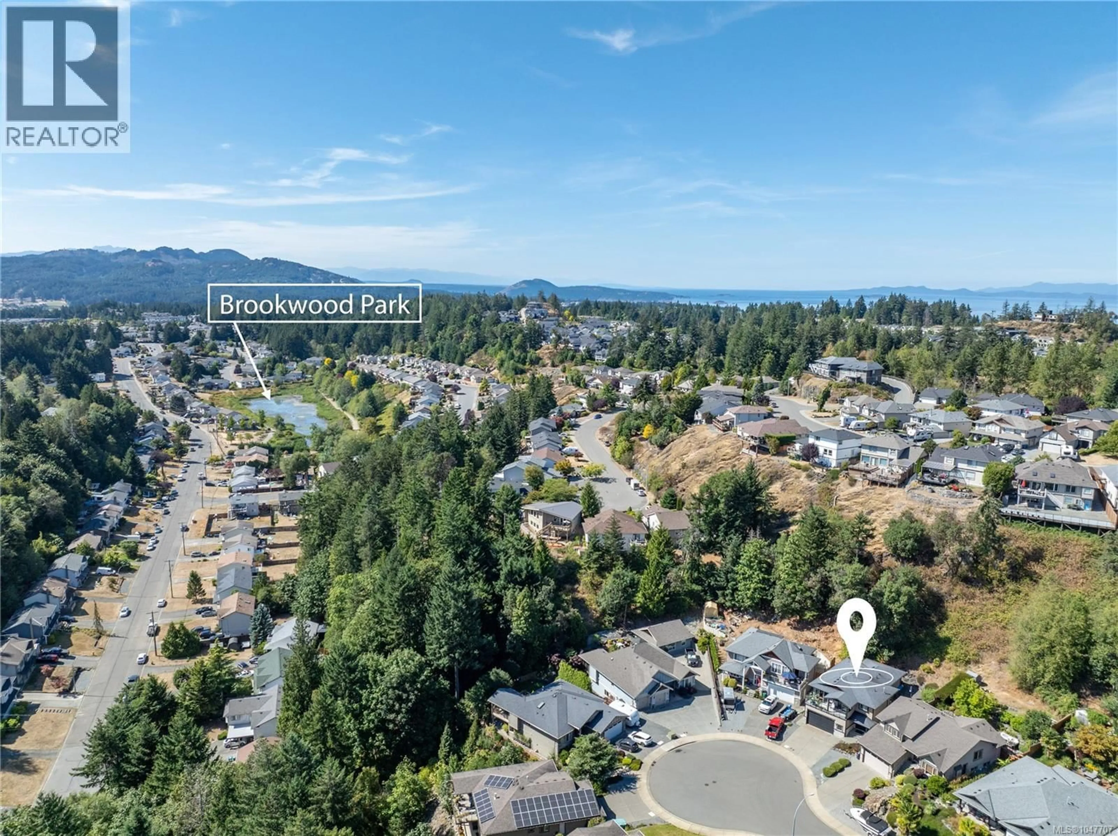 A pic from outside/outdoor area/front of a property/back of a property/a pic from drone, mountain view for 5141 OWLSTONE PLACE, Nanaimo British Columbia V9T0B4