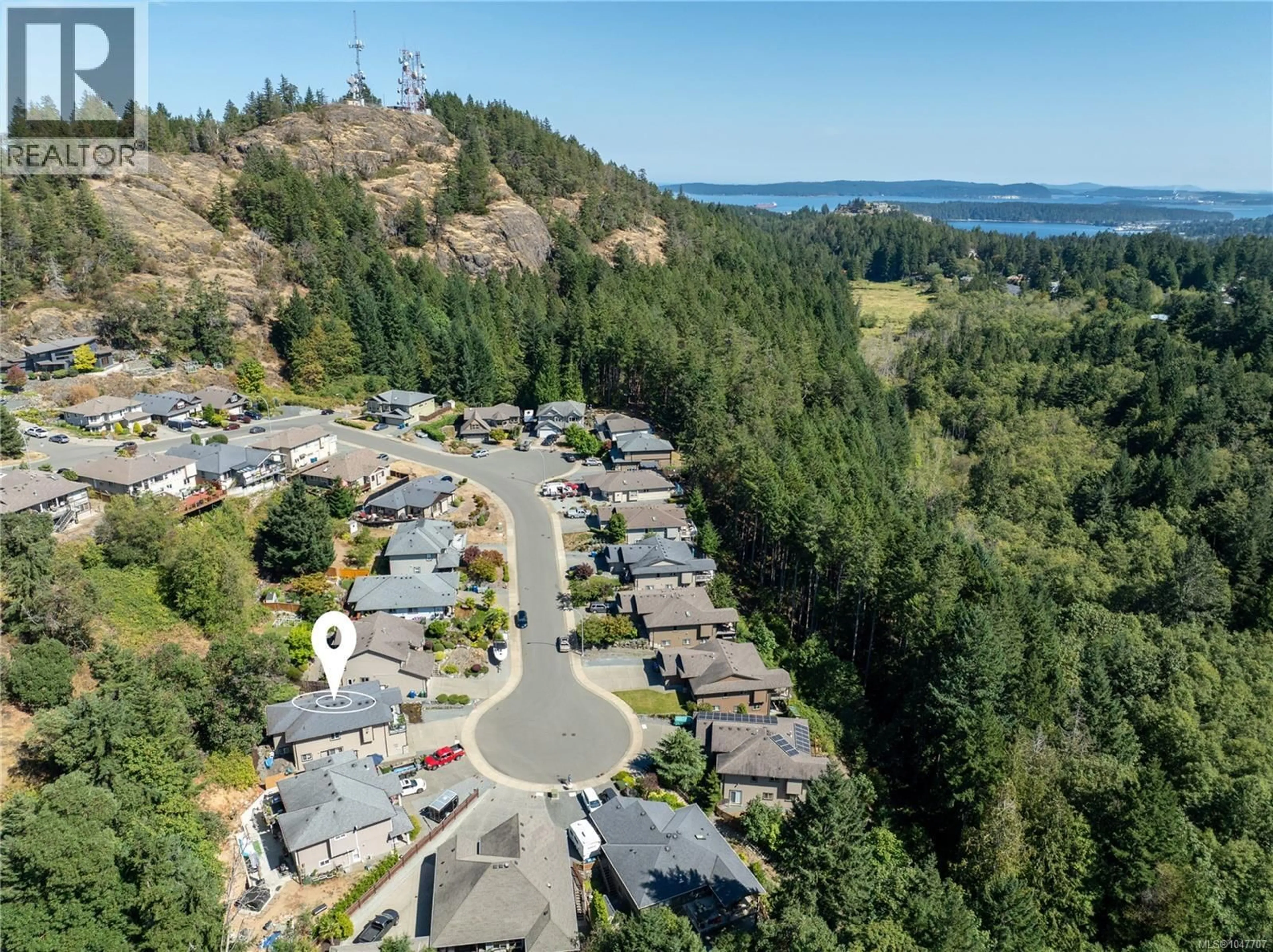 A pic from outside/outdoor area/front of a property/back of a property/a pic from drone, mountain view for 5141 OWLSTONE PLACE, Nanaimo British Columbia V9T0B4