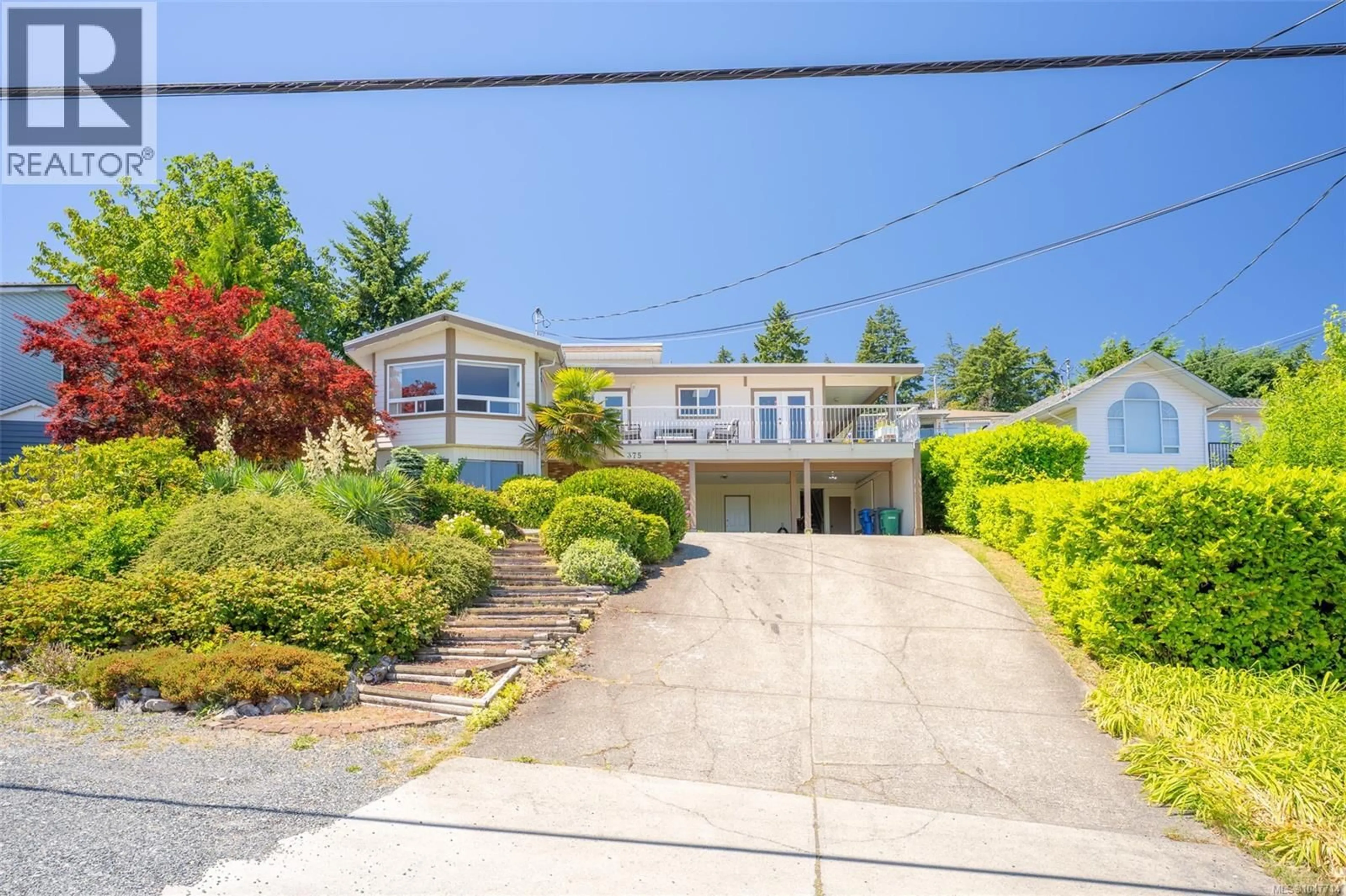 A pic from outside/outdoor area/front of a property/back of a property/a pic from drone, street for 375 CARIBOO DRIVE, Nanaimo British Columbia V9R6A4