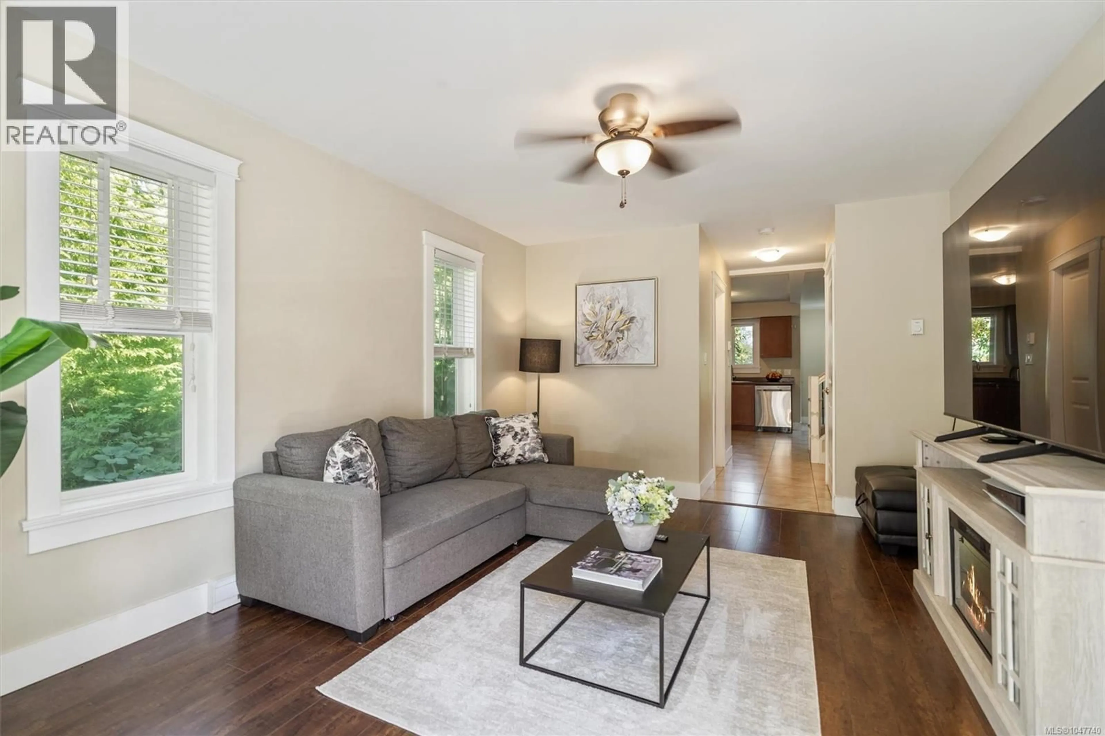 Living room with furniture, wood/laminate floor for 209 - 954 WALFRED ROAD, Langford British Columbia V9C0E2