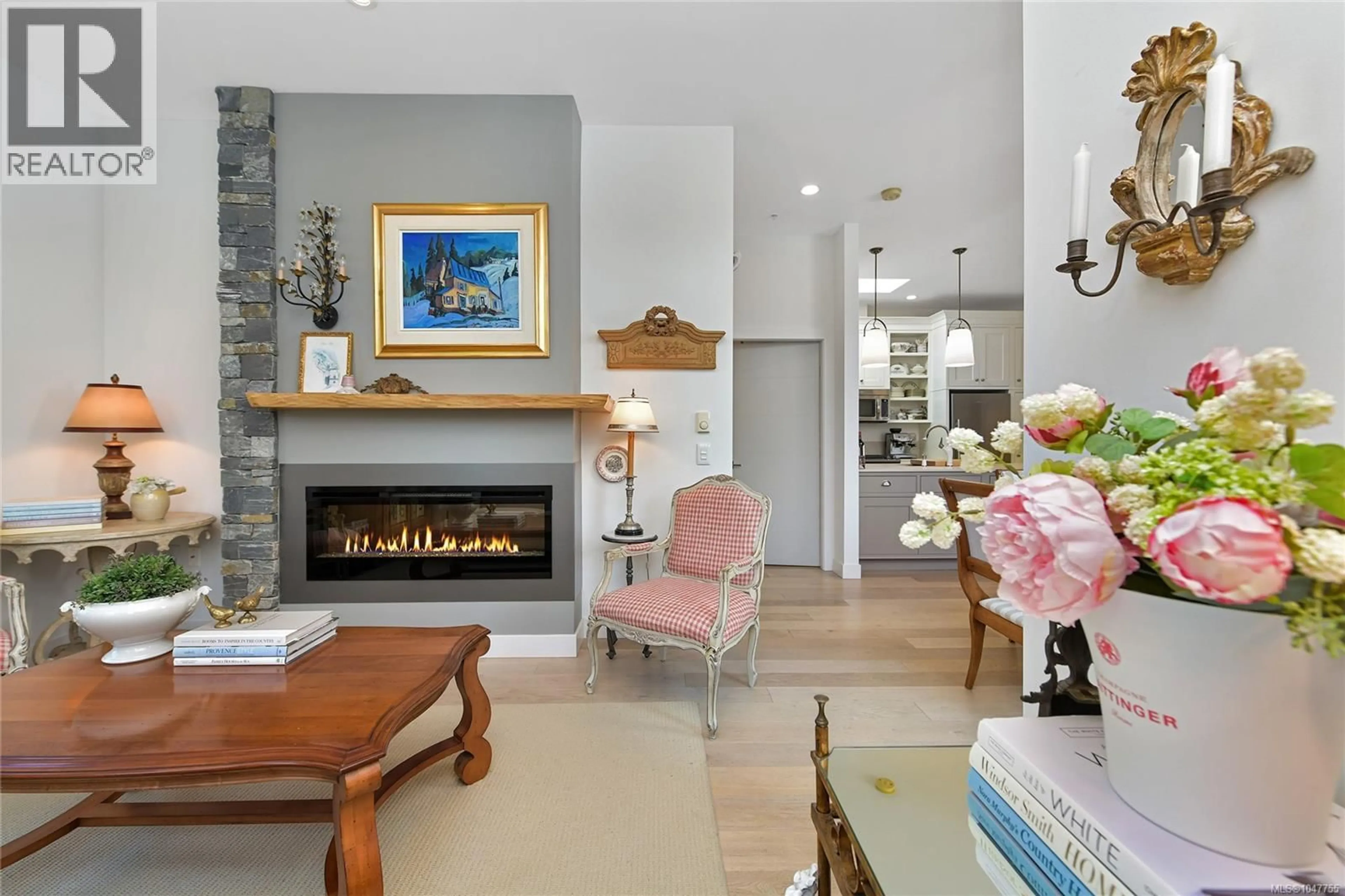 Living room with furniture, unknown for 301 - 2580 PENRHYN STREET, Saanich British Columbia V8N1G3