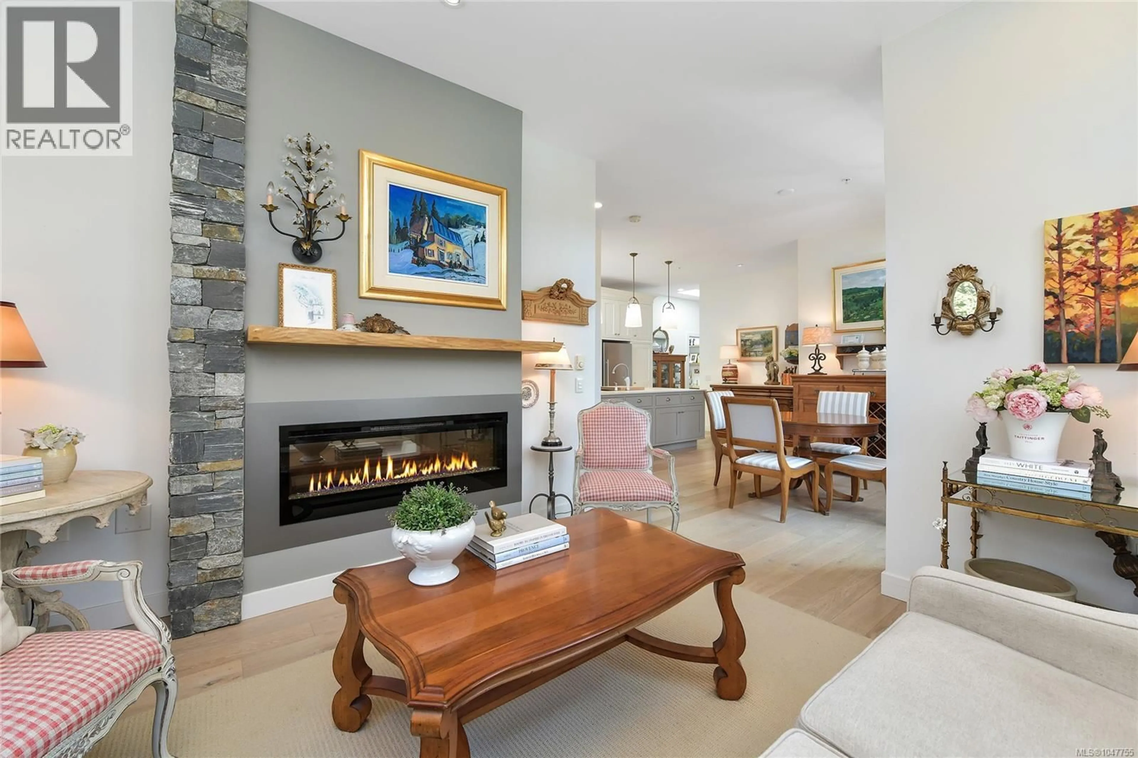 Living room with furniture, ceramic/tile floor for 301 - 2580 PENRHYN STREET, Saanich British Columbia V8N1G3