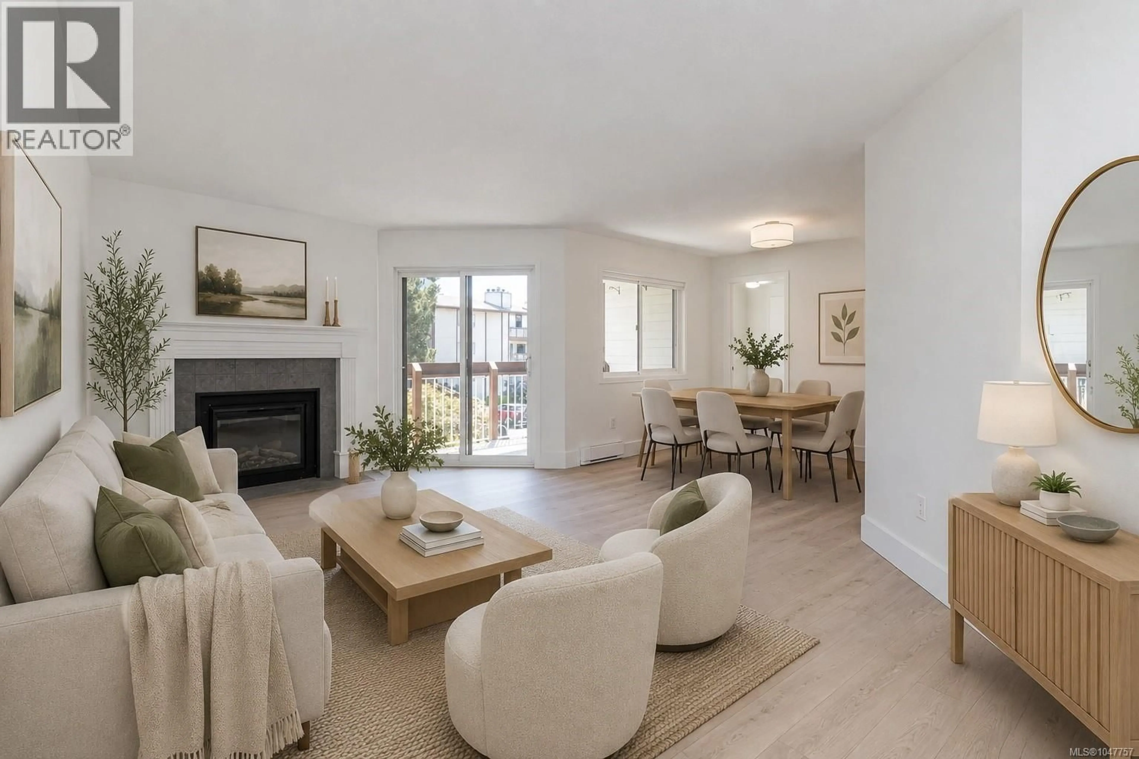 Living room with furniture, wood/laminate floor for 310 - 73 GORGE ROAD WEST, Saanich British Columbia V9A1L9
