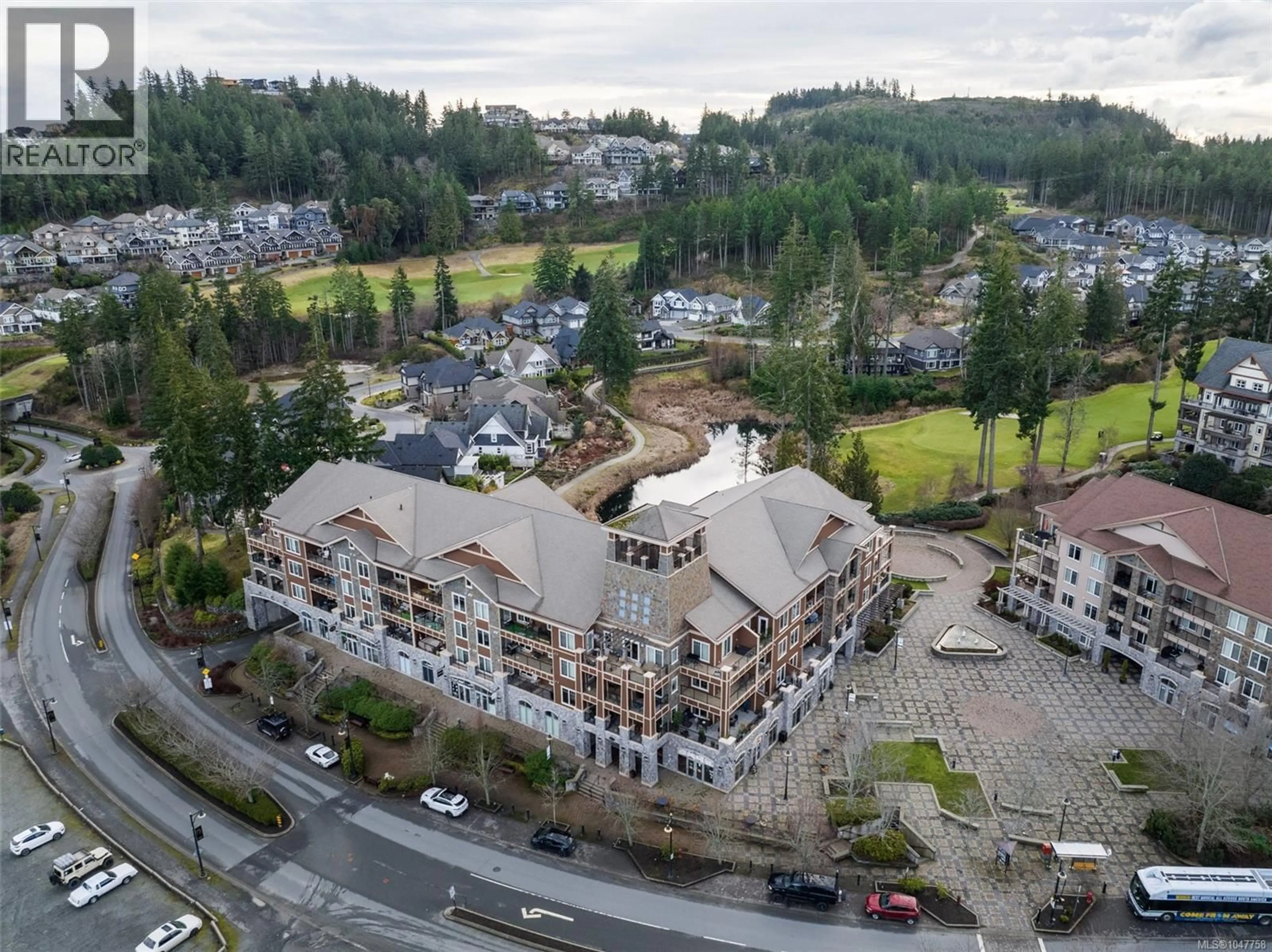 A pic from outside/outdoor area/front of a property/back of a property/a pic from drone, mountain view for 211 - 1325 BEAR MOUNTAIN PARKWAY, Langford British Columbia V9B6T8