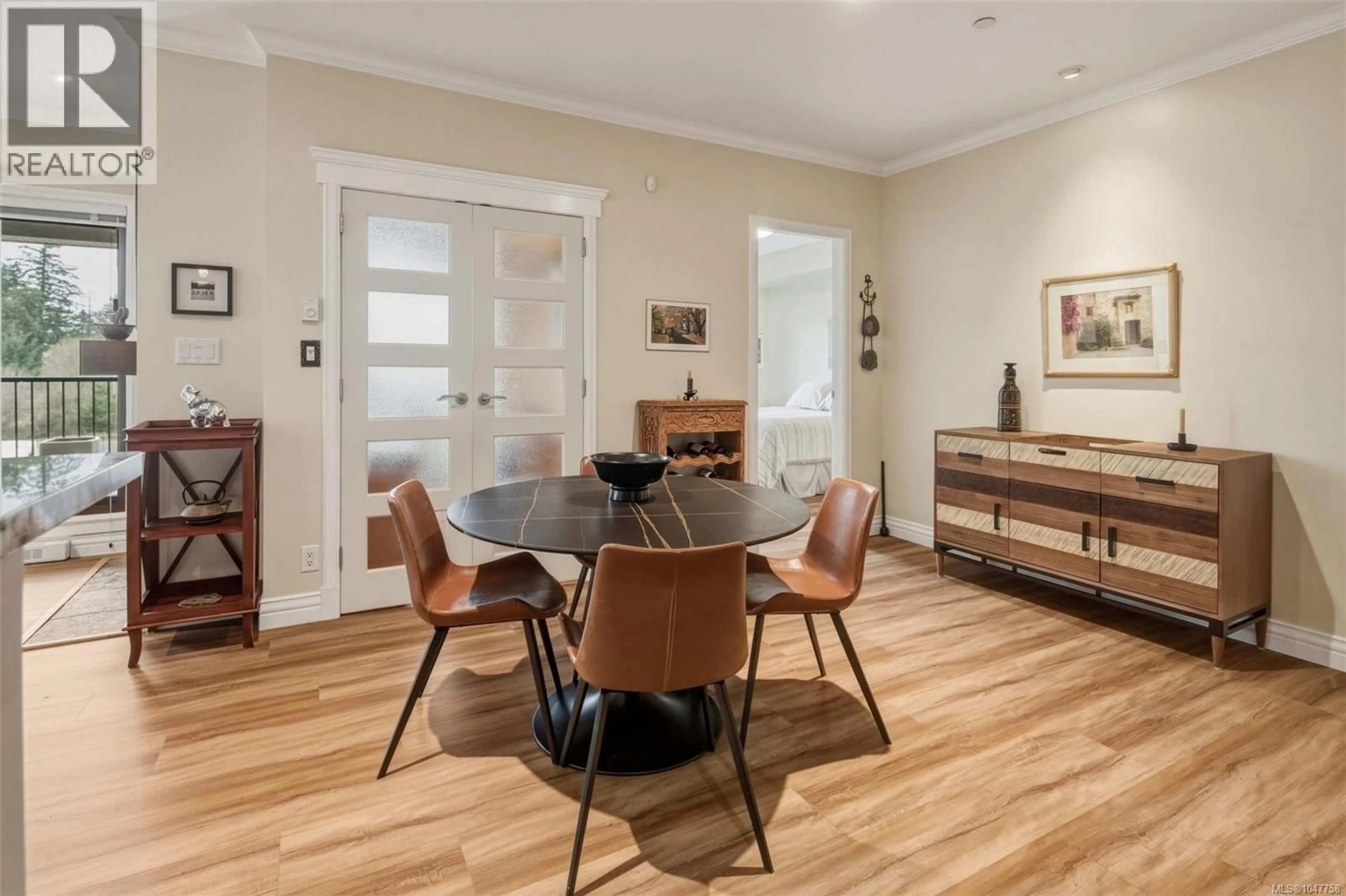Dining room, wood/laminate floor for 211 - 1325 BEAR MOUNTAIN PARKWAY, Langford British Columbia V9B6T8