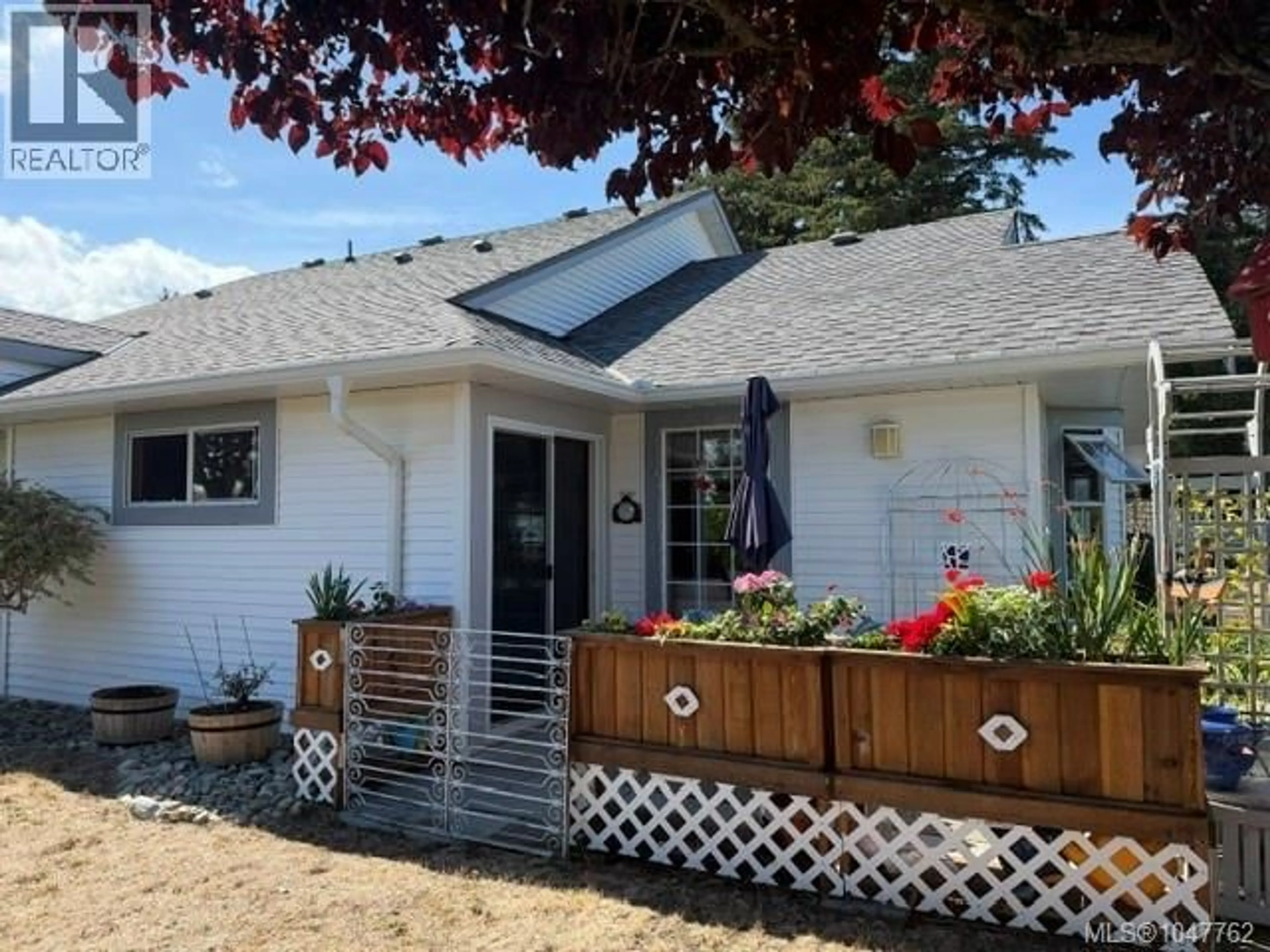 Home with vinyl exterior material, street for 4 - 305 BLOWER ROAD, Parksville British Columbia V9P2L1