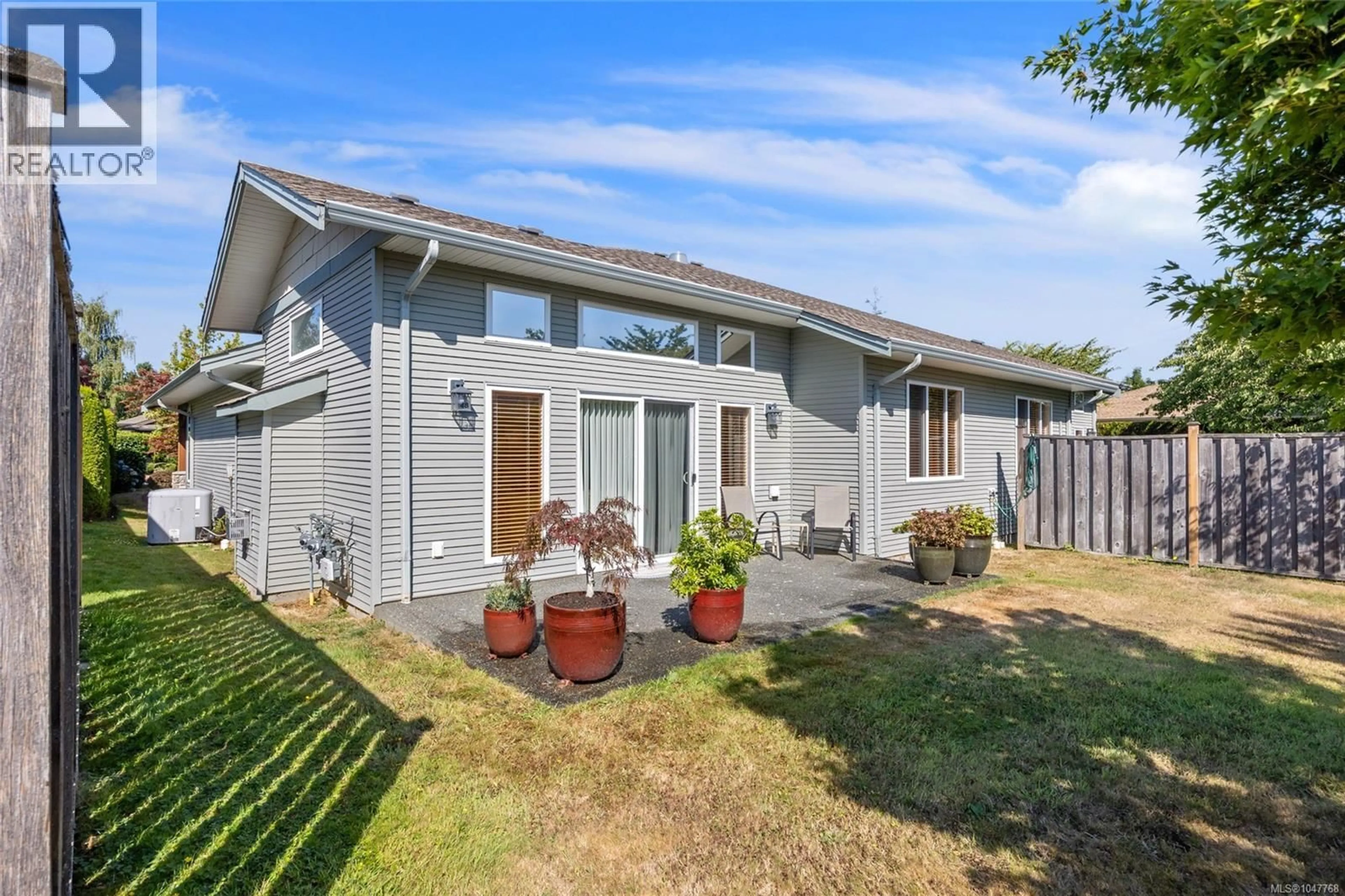 Home with vinyl exterior material, street for 48 - 2300 MURRELET DRIVE, Comox British Columbia V9M4J2