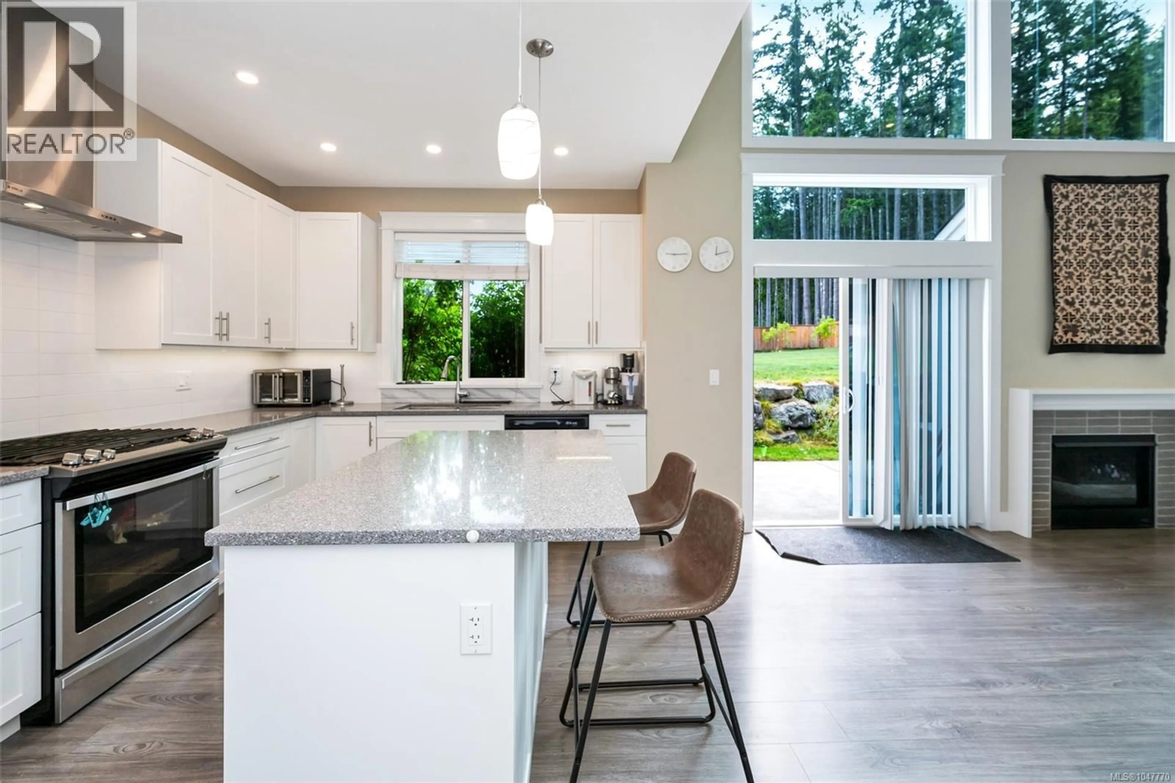 Open concept kitchen, ceramic/tile floor for 2466 BLAIRGOWRIE ROAD, Mill Bay British Columbia V8H1H3