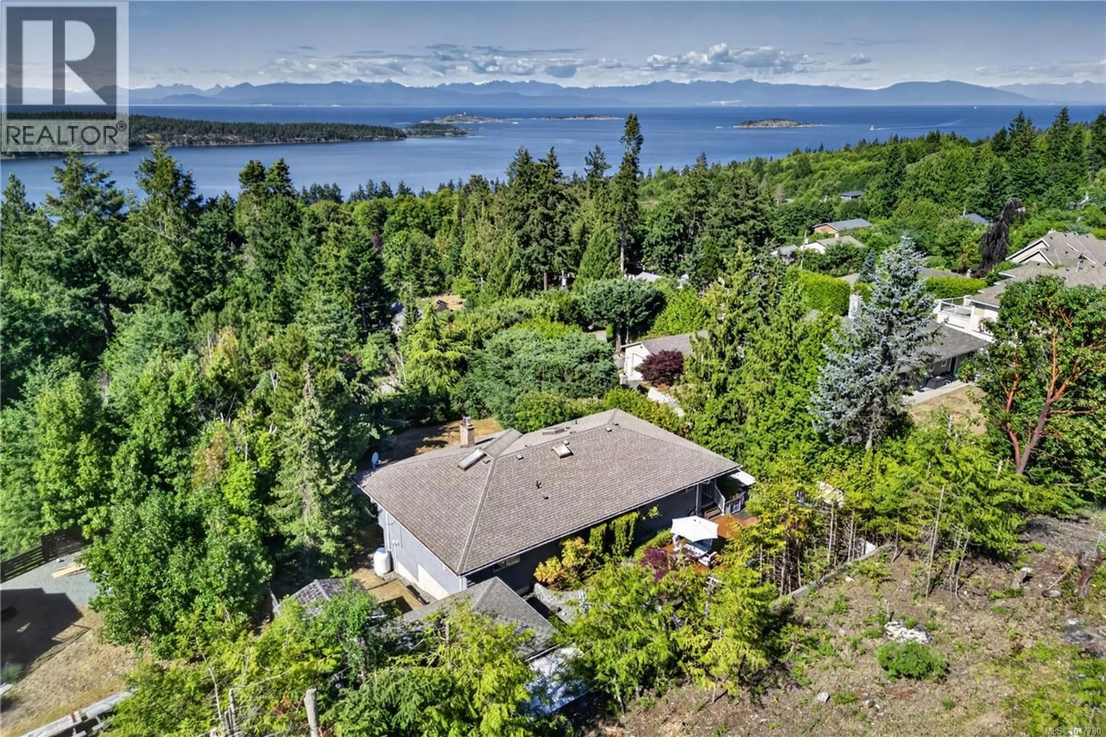 A pic from outside/outdoor area/front of a property/back of a property/a pic from drone, water/lake/river/ocean view for 8109 NORTHWIND DRIVE, Lantzville British Columbia V0R2H0