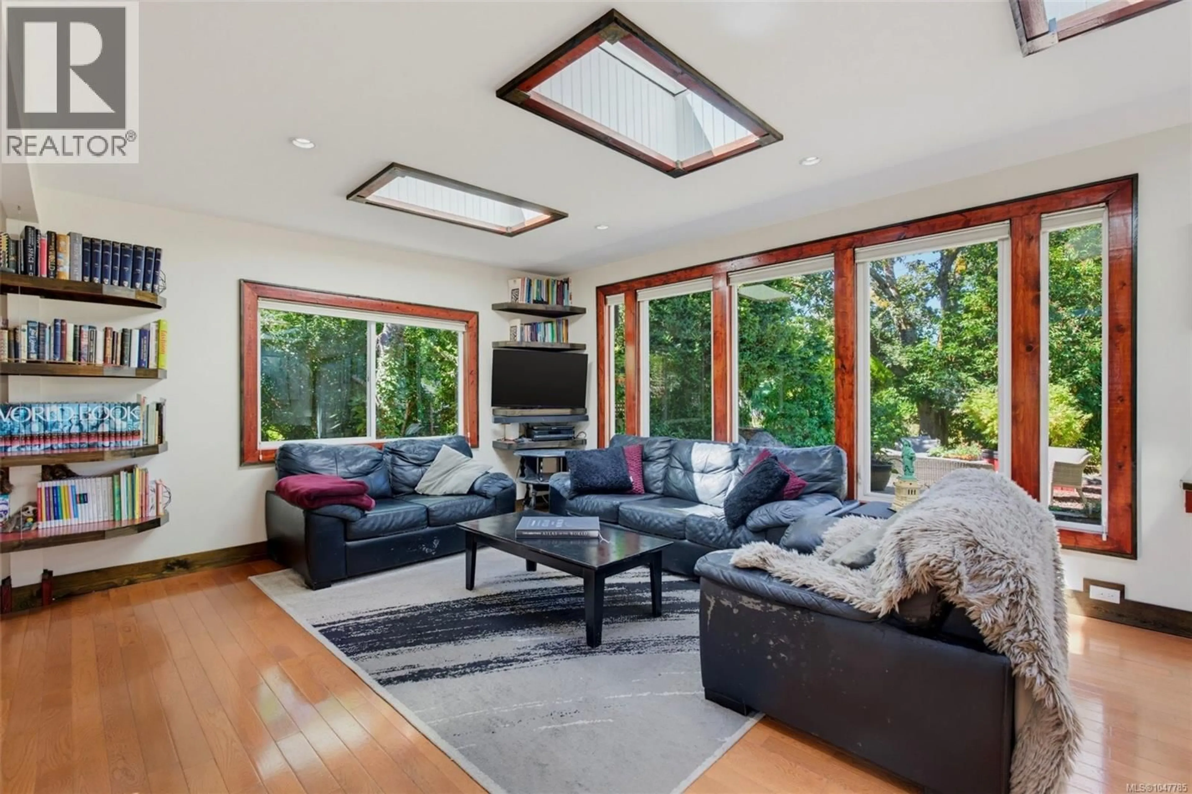 Living room with furniture, unknown for 1219 OLD ESQUIMALT ROAD, Esquimalt British Columbia V9A4X7