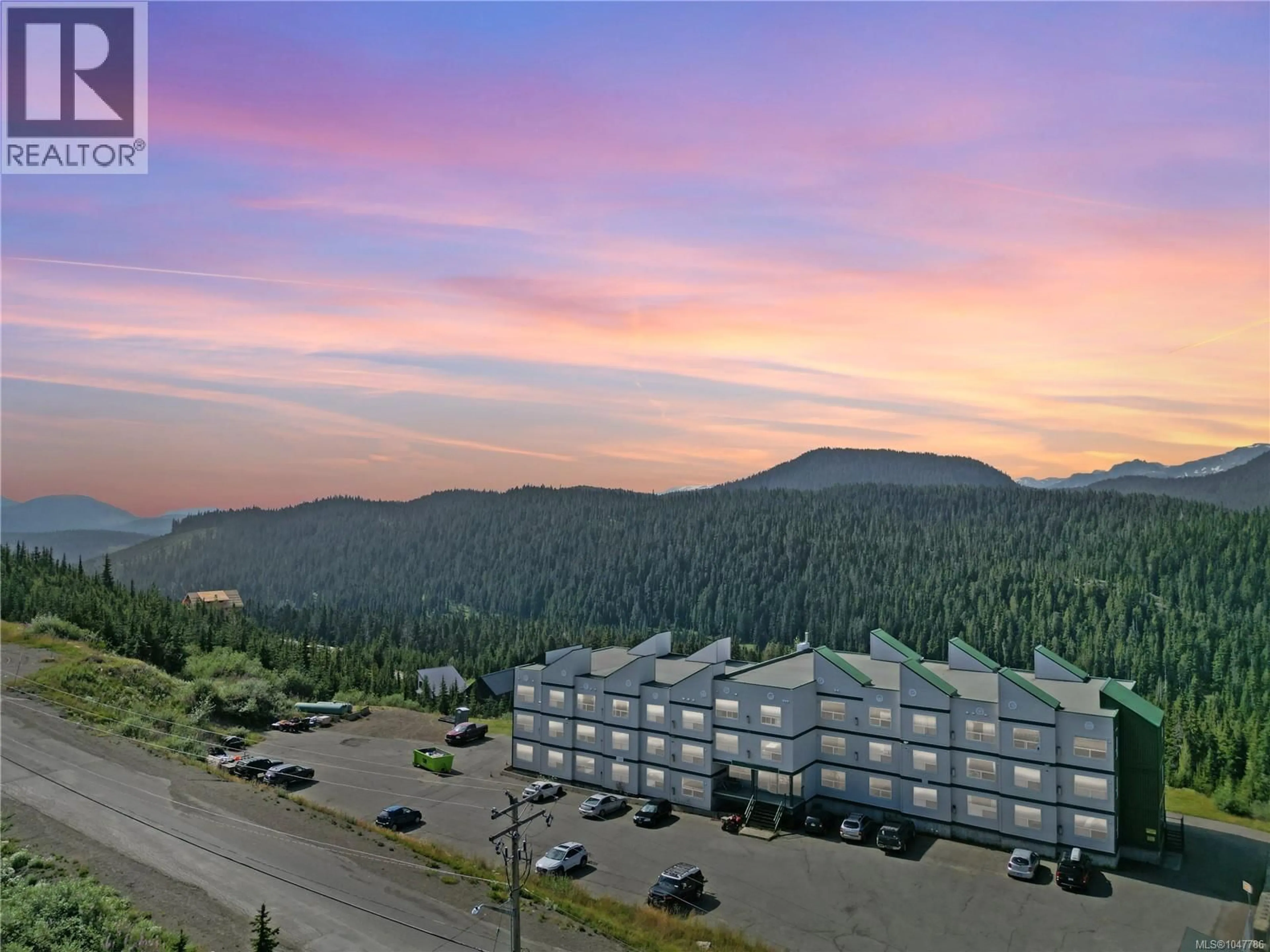 A pic from outside/outdoor area/front of a property/back of a property/a pic from drone, mountain view for 205 - 1105 HENRY ROAD, Courtenay British Columbia V9J1L0