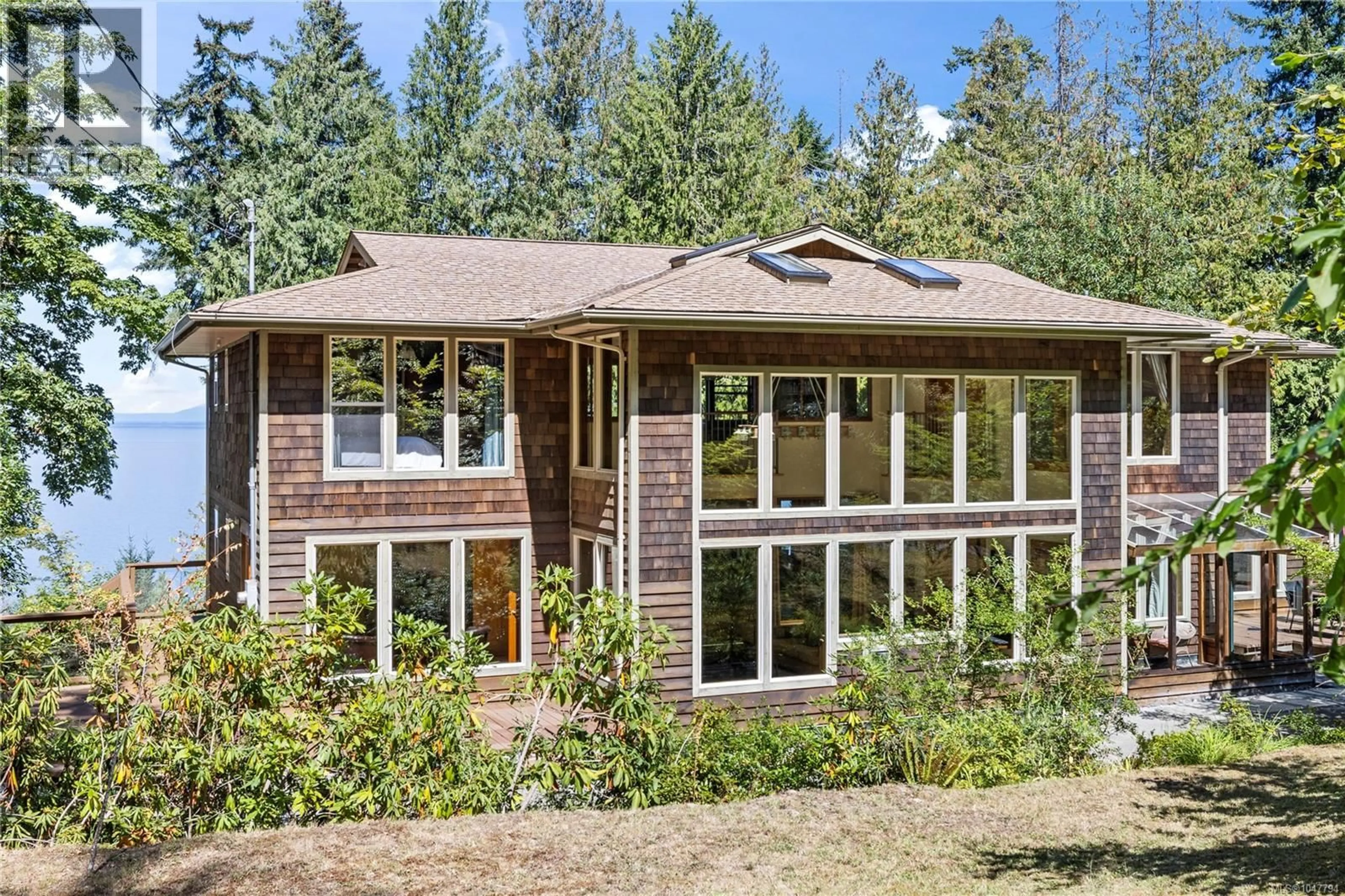 Home with brick exterior material, unknown for 2185 WIDGEON ROAD, Qualicum Beach British Columbia V9K1Y8