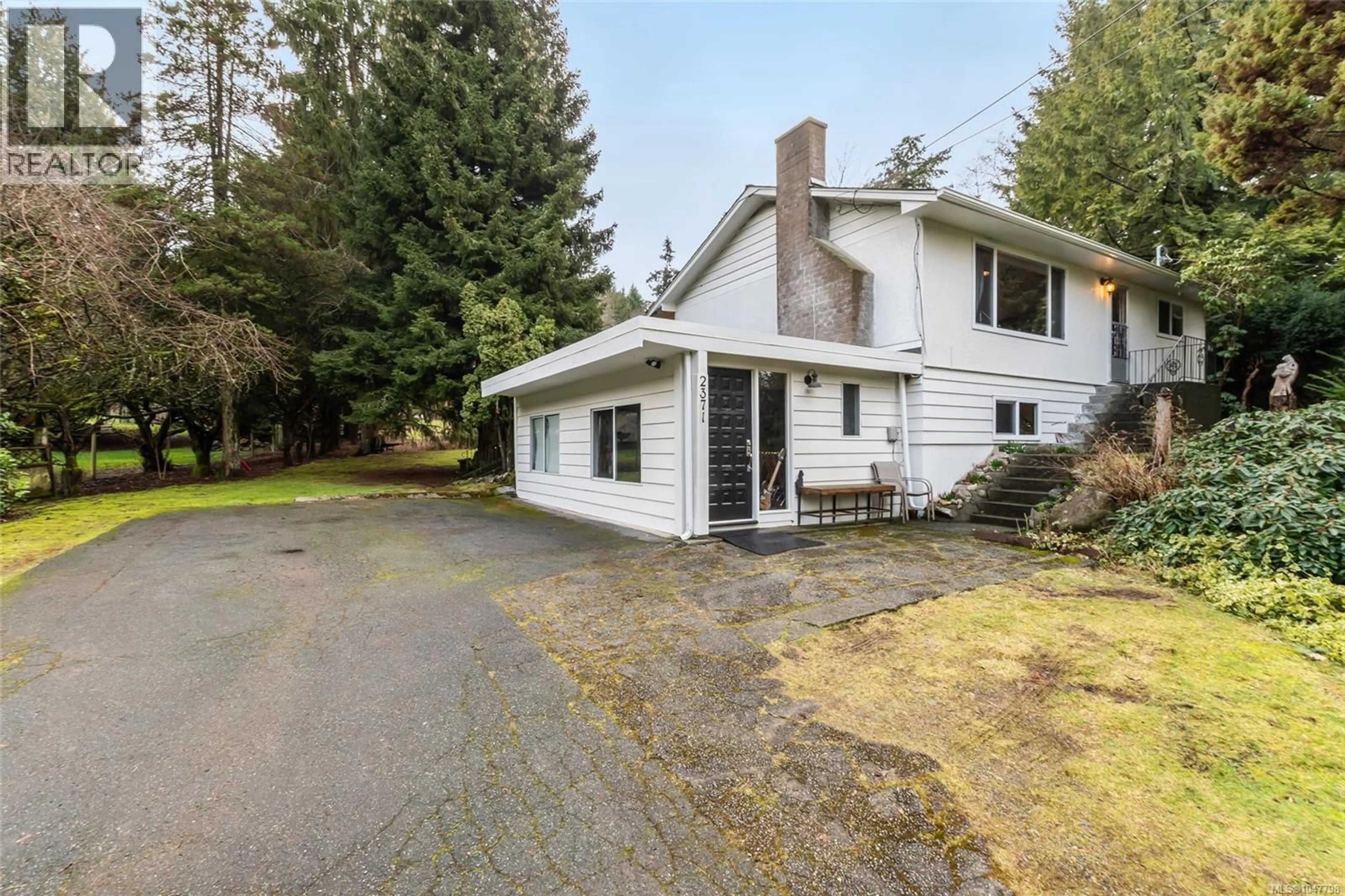 A pic from outside/outdoor area/front of a property/back of a property/a pic from drone, street for 2371 JINGLE POT ROAD, Nanaimo British Columbia V9R6W2