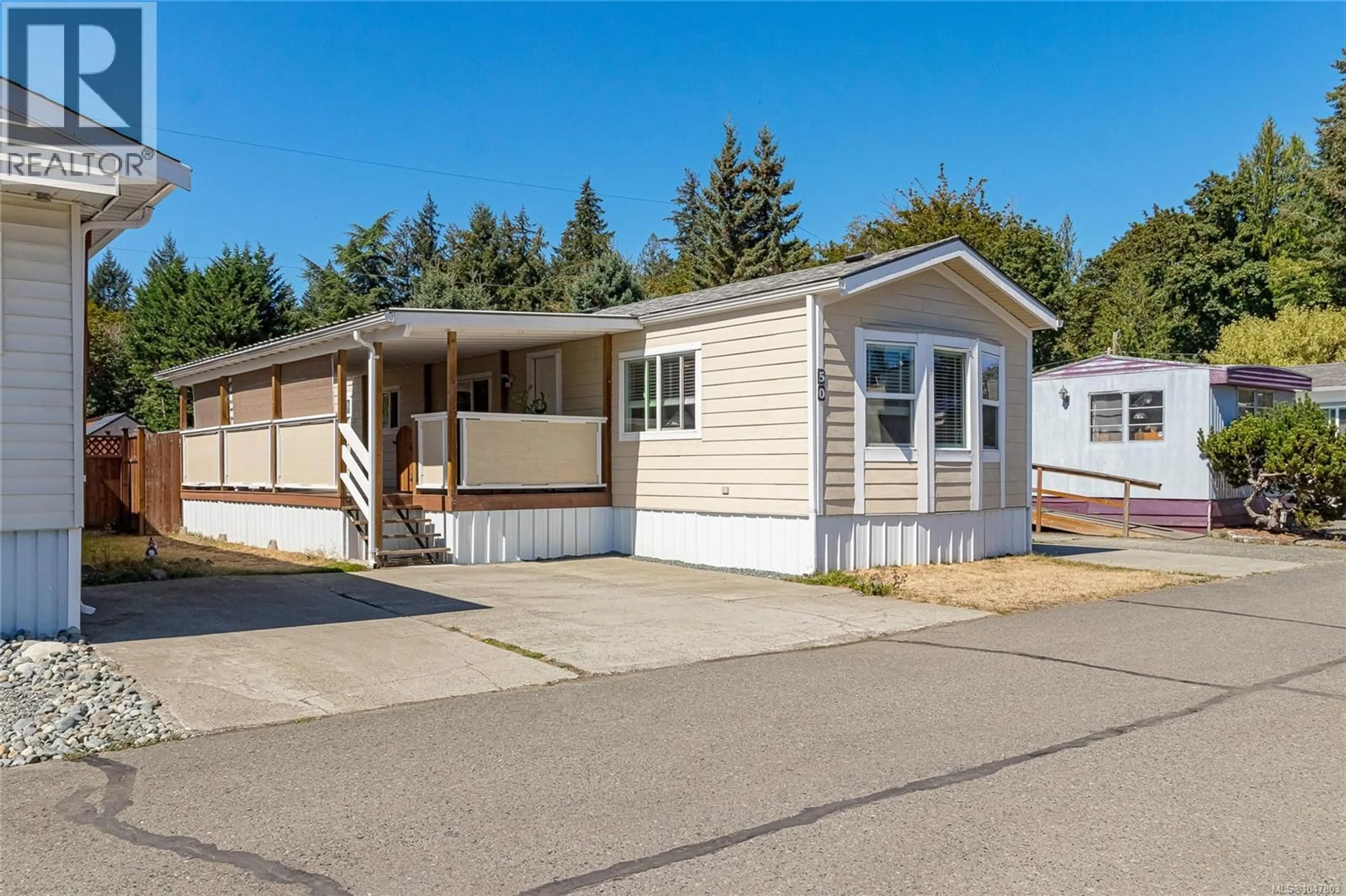 Home with vinyl exterior material, street for 50 - 3497 GIBBINS ROAD, Duncan British Columbia V9L6C9