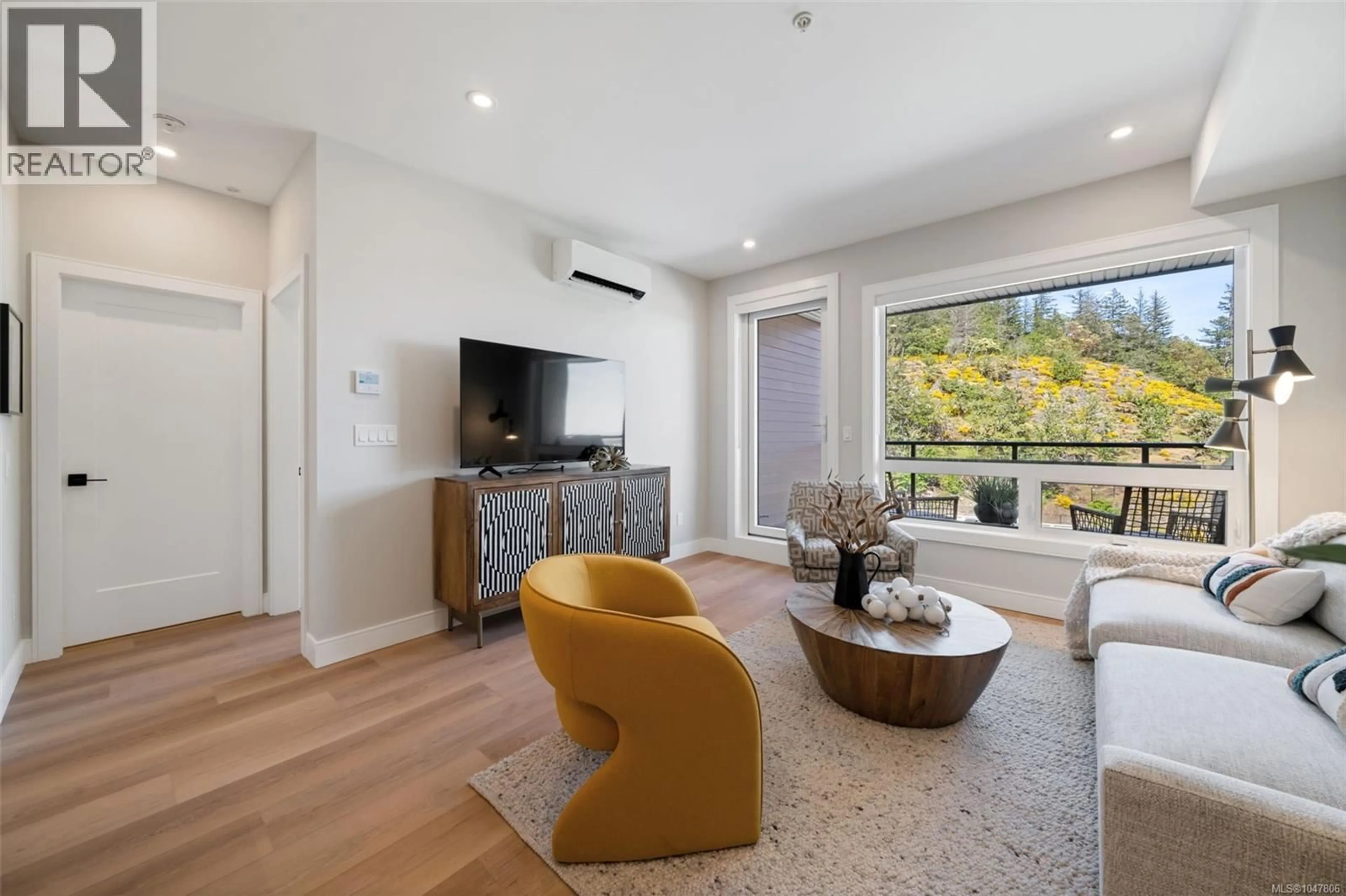 Living room with furniture, unknown for 210 - 1810 SELENITE PLACE, Langford British Columbia V9B7E2