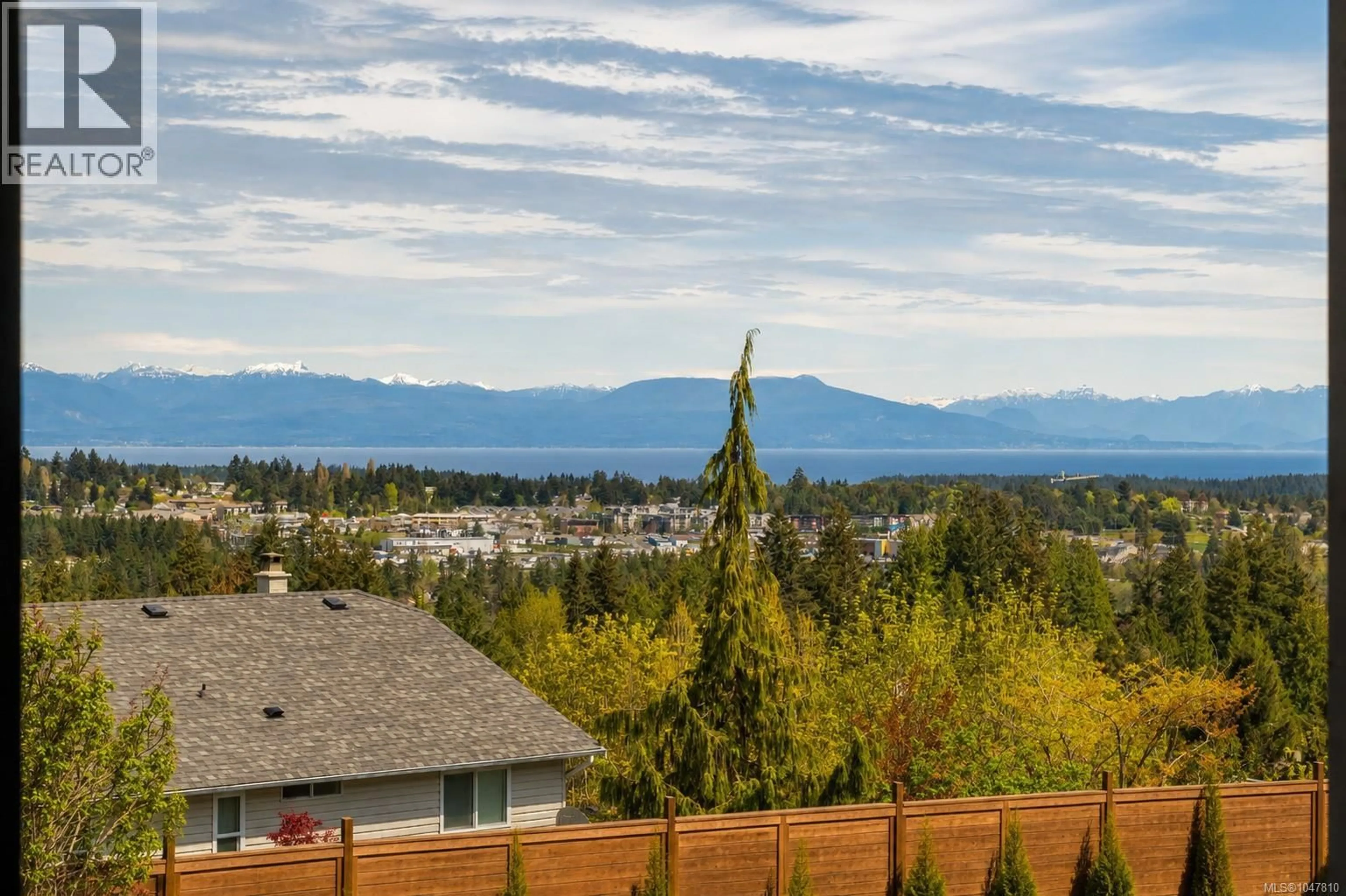 A pic from outside/outdoor area/front of a property/back of a property/a pic from drone, mountain view for 101 - 2302 ARBOT ROAD, Nanaimo British Columbia V9R6S8