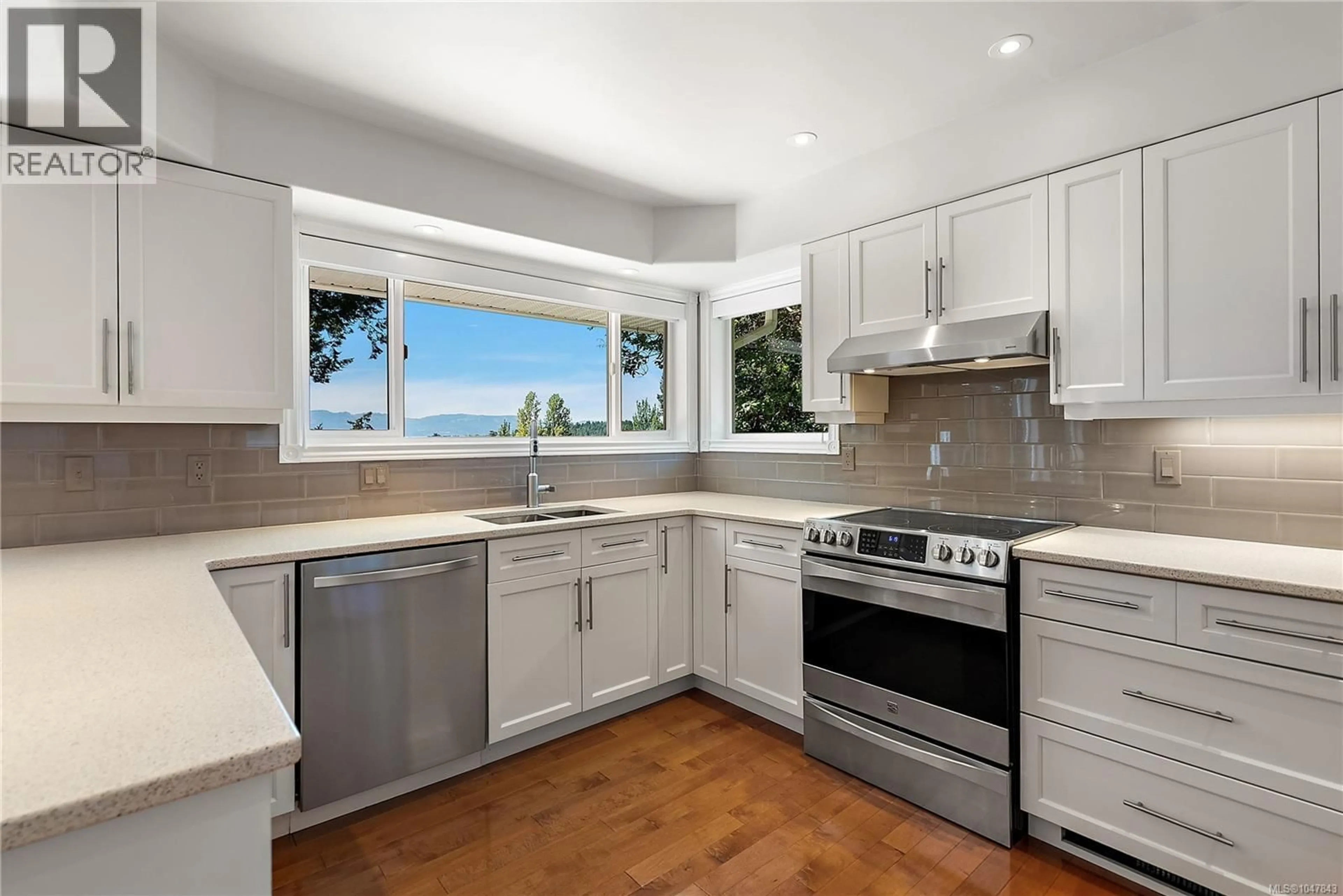 Open concept kitchen, ceramic/tile floor for 10938 PRENTICE PLACE, North Saanich British Columbia V8L5H7