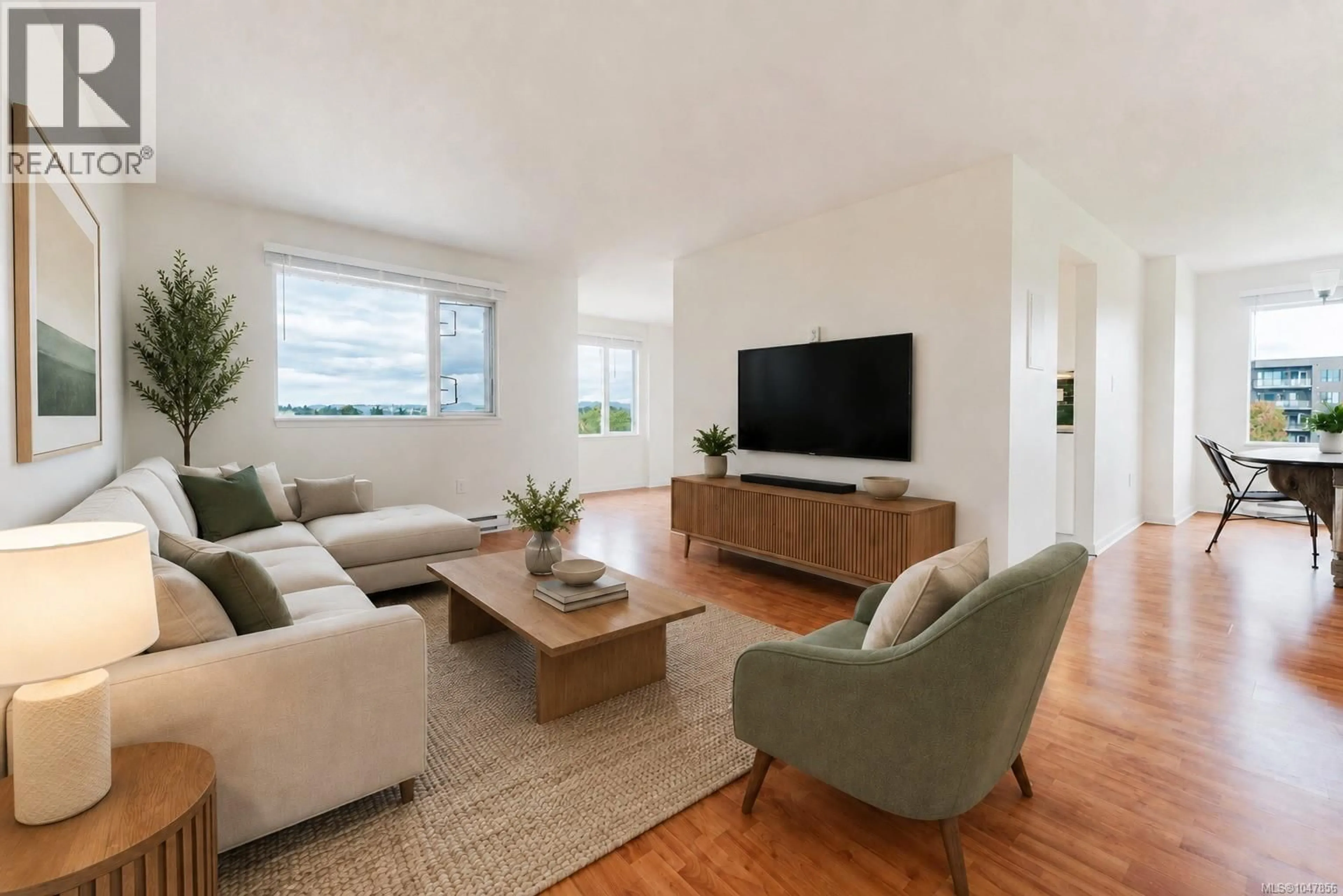 Living room with furniture, wood/laminate floor for 508 - 103 GORGE ROAD EAST, Victoria British Columbia V9A6Z2