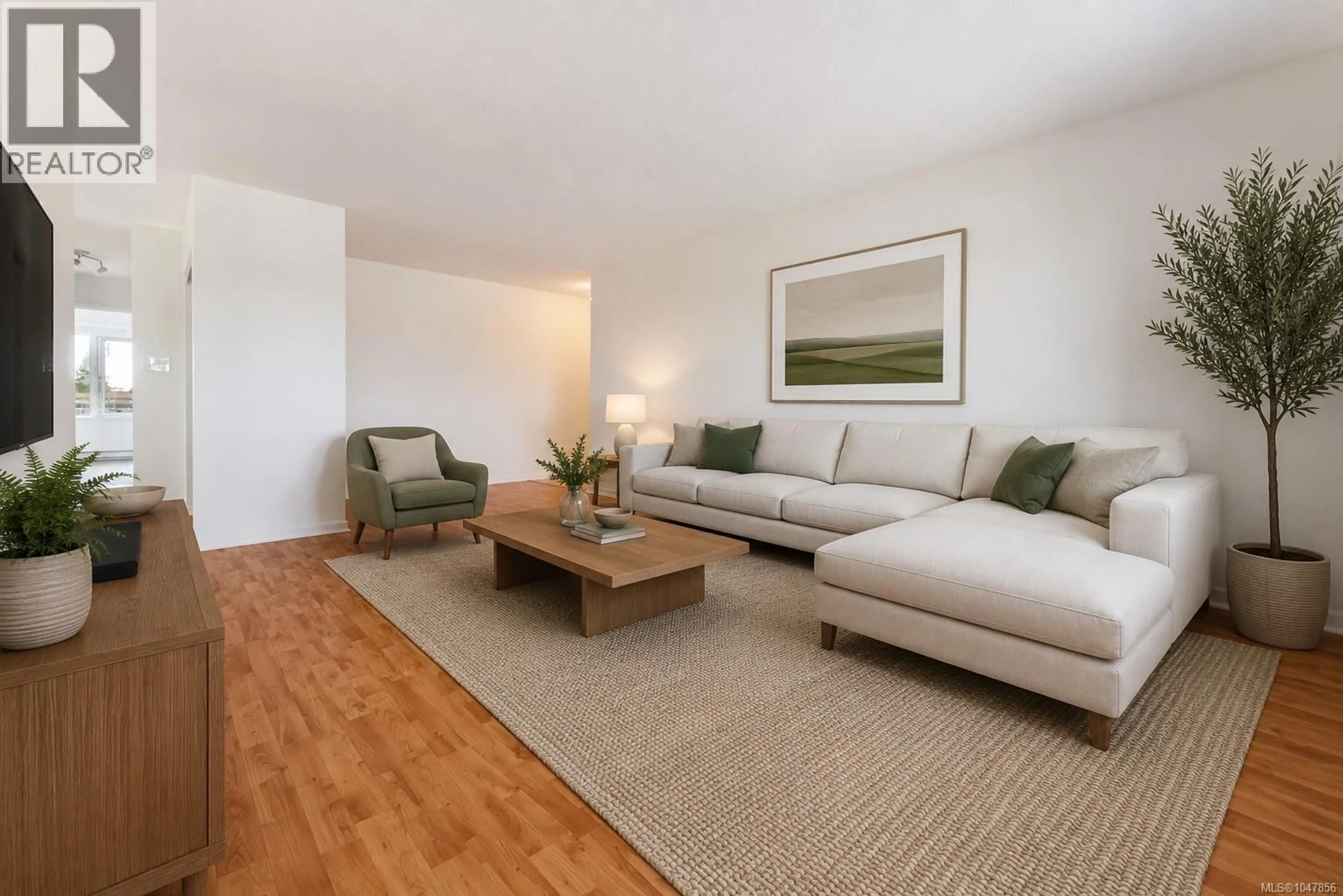 Living room with furniture, wood/laminate floor for 508 - 103 GORGE ROAD EAST, Victoria British Columbia V9A6Z2